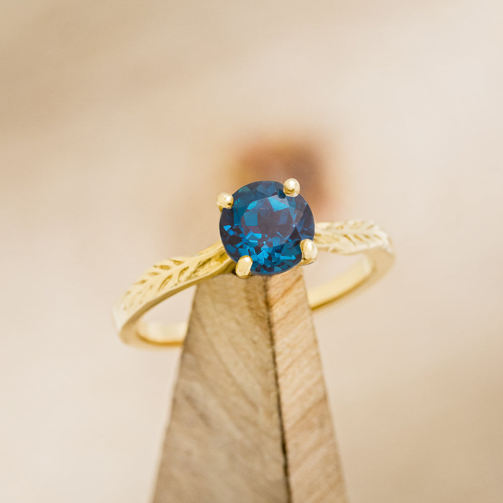 "HOPE" - ROUND CUT LAB-GROWN ALEXANDRITE SOLITAIRE ENGAGEMENT RING WITH FEATHER ACCENTS-8