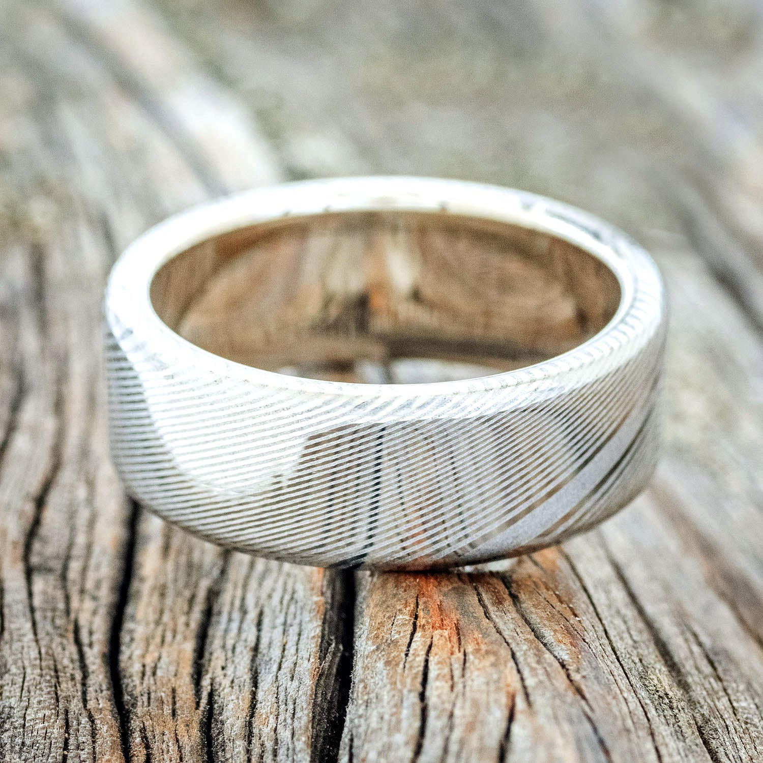"VULCAN" - DAMASCUS STEEL WEDDING BAND WITH 14K GOLD LINING-11