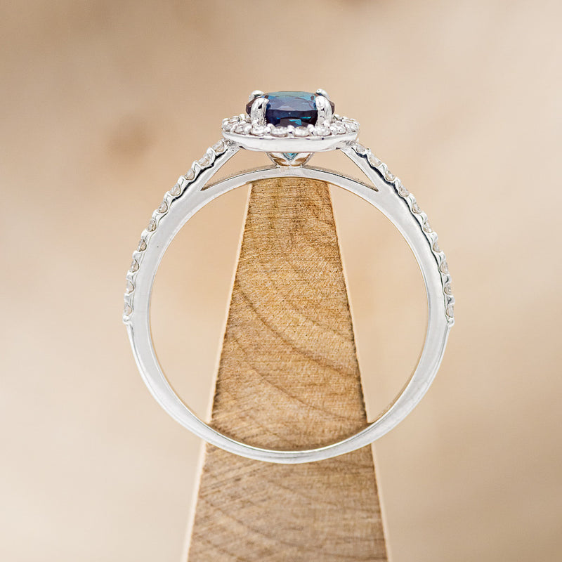 "AURORA" - ROUND CUT LAB-GROWN ALEXANDRITE ENGAGEMENT RING WITH DIAMOND HALO & ACCENTS