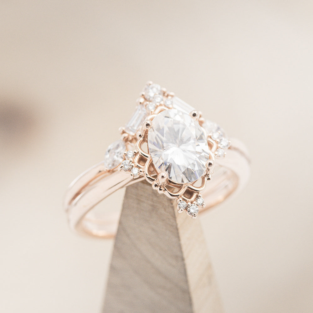 "TREVA" - OVAL MOISSANITE ENGAGEMENT RING WITH DIAMOND ACCENTS & "MELODY" TRACER-18