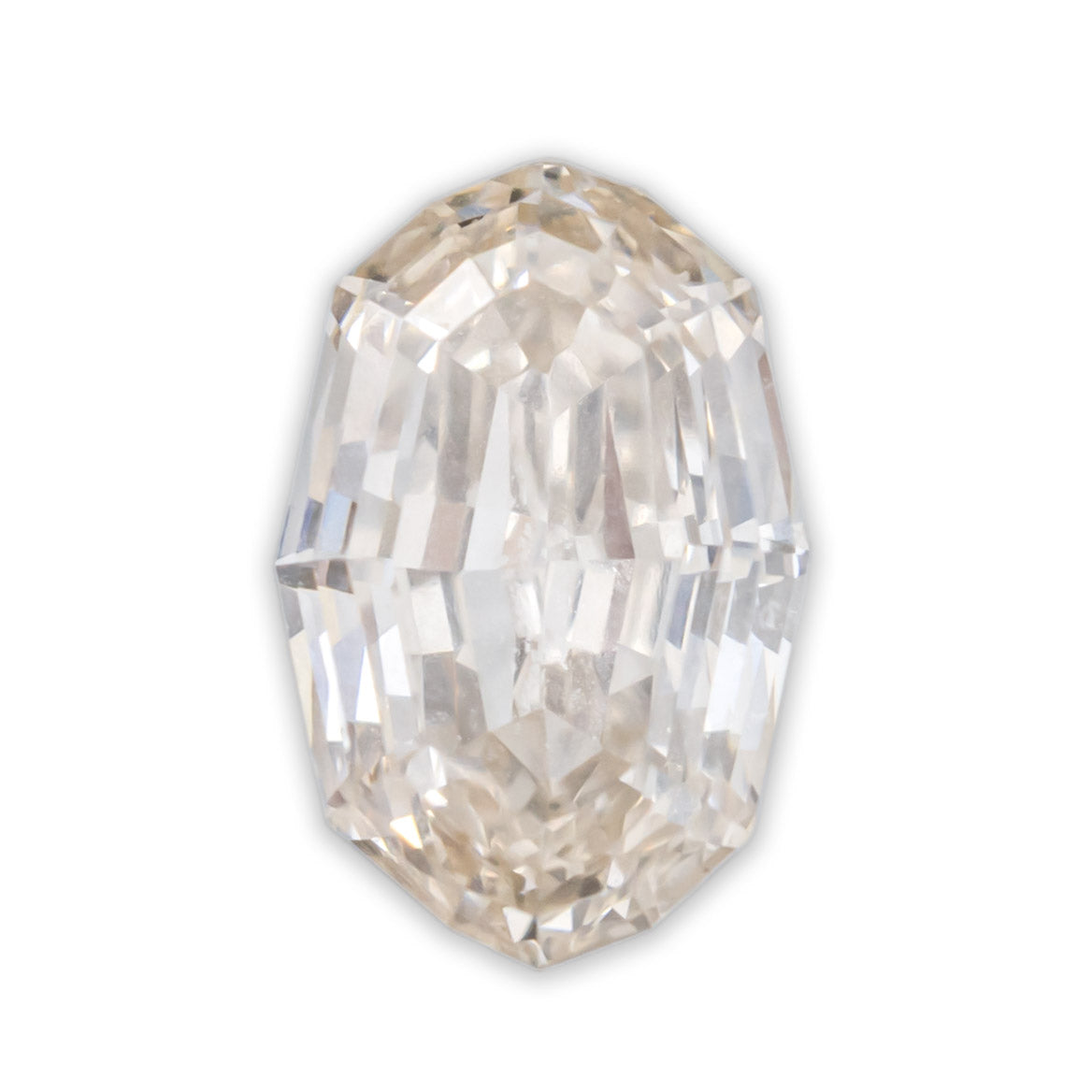 0.67ct 6.79x4.45x2.73mm Oval Brilliant Cut Light Peach Champagne Diamond