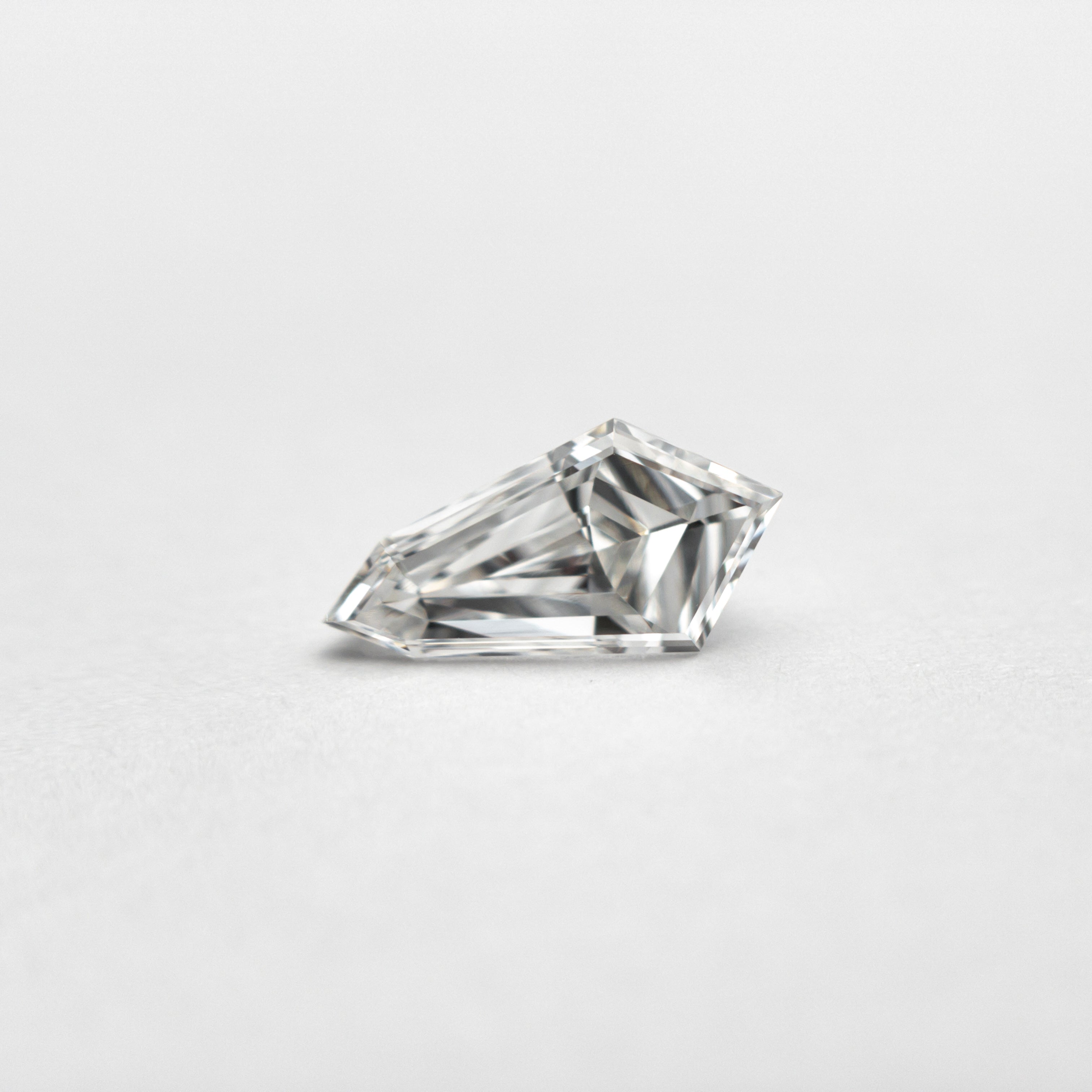 0.58ct 8.20x4.25x3.15mm VS2 F Kite Step Cut 19677-05-Staghead Designs