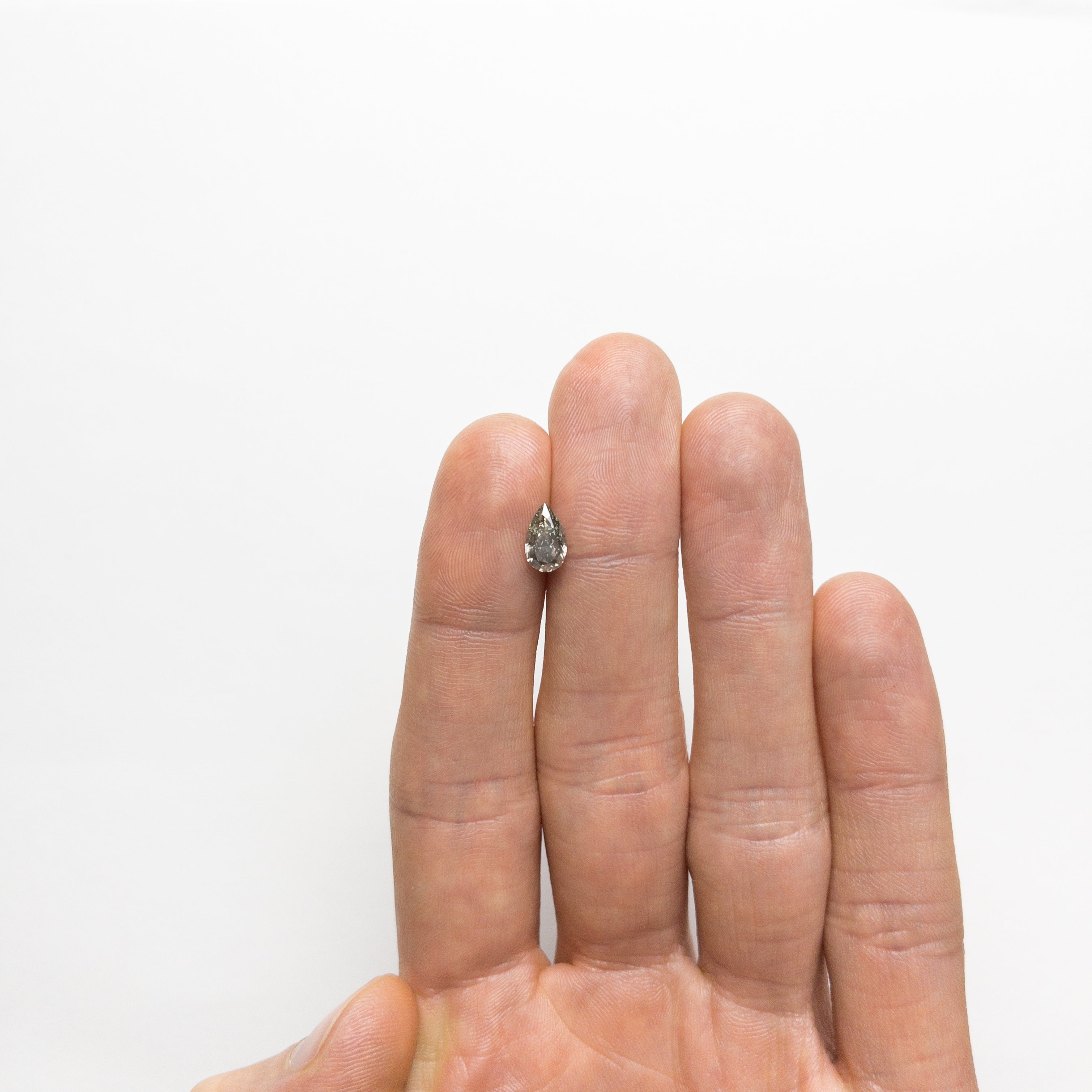 1.07ct 8.47x5.07x3.48mm Fancy Grey Pear Brilliant 19913-19-Staghead Designs