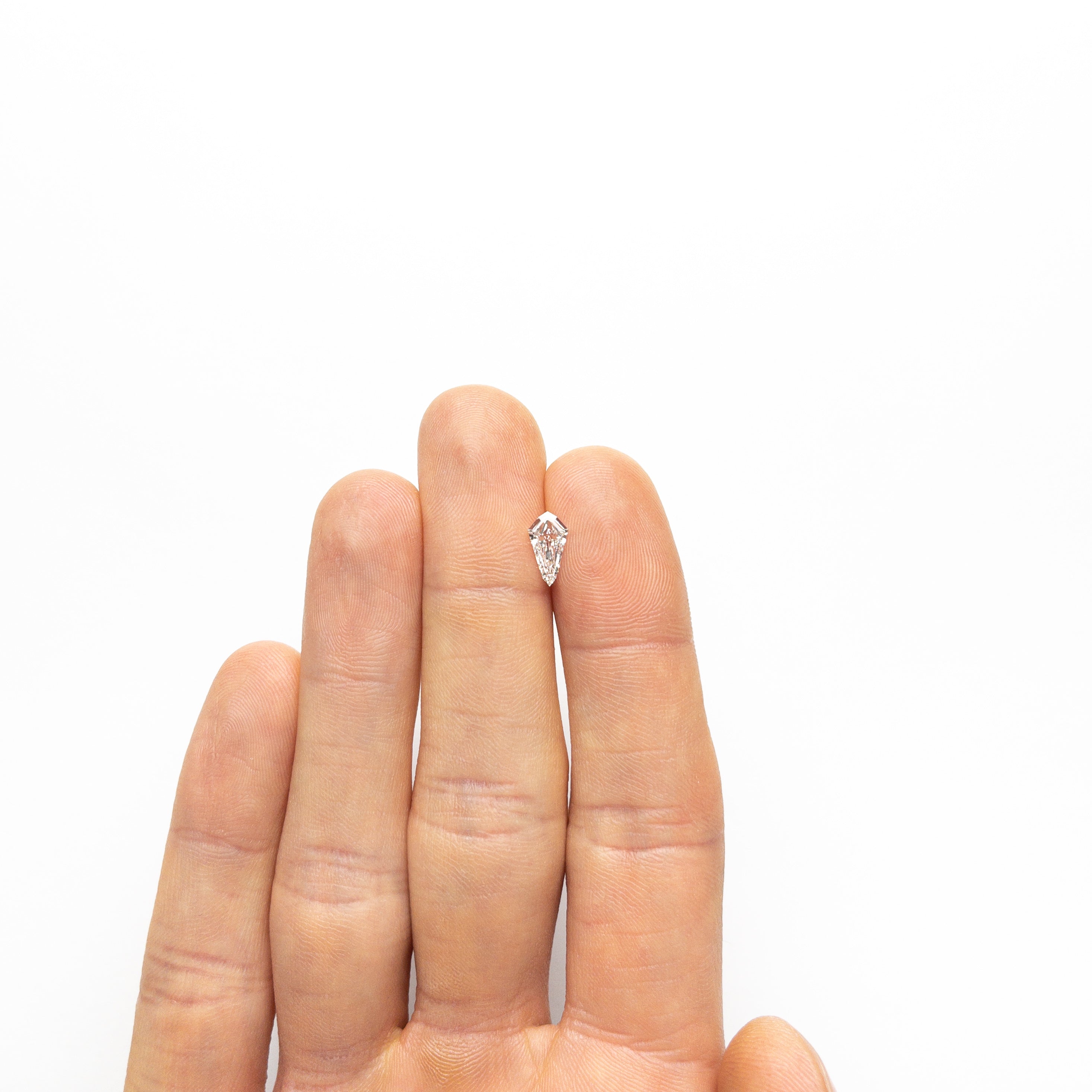 0.72ct 9.53x5.13x2.32mm SI1 D Kite Step Cut 21690-01-Staghead Designs