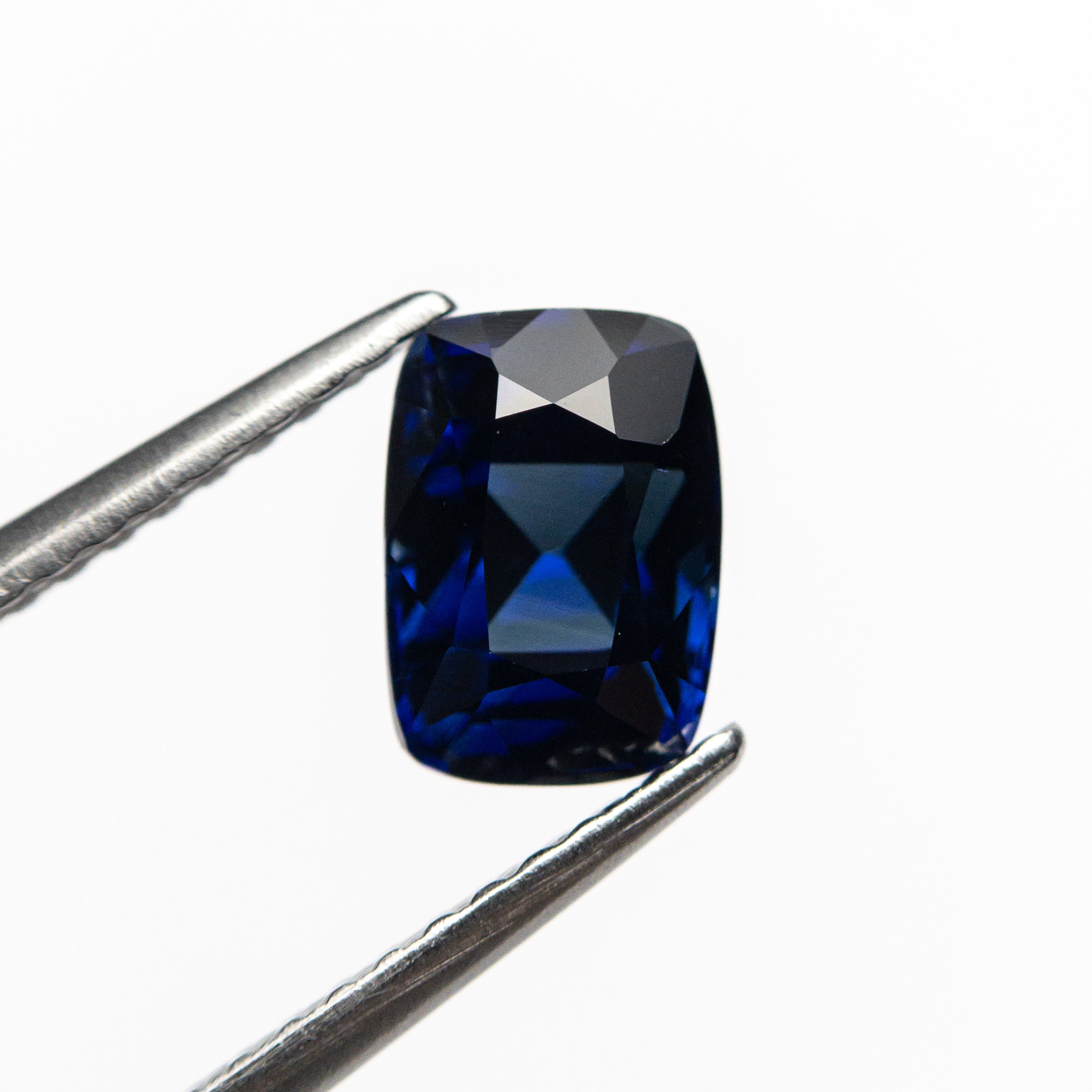 1.51ct 7.06x5.04x4.55mm Cushion Brilliant Sapphire 22028-01-Staghead Designs