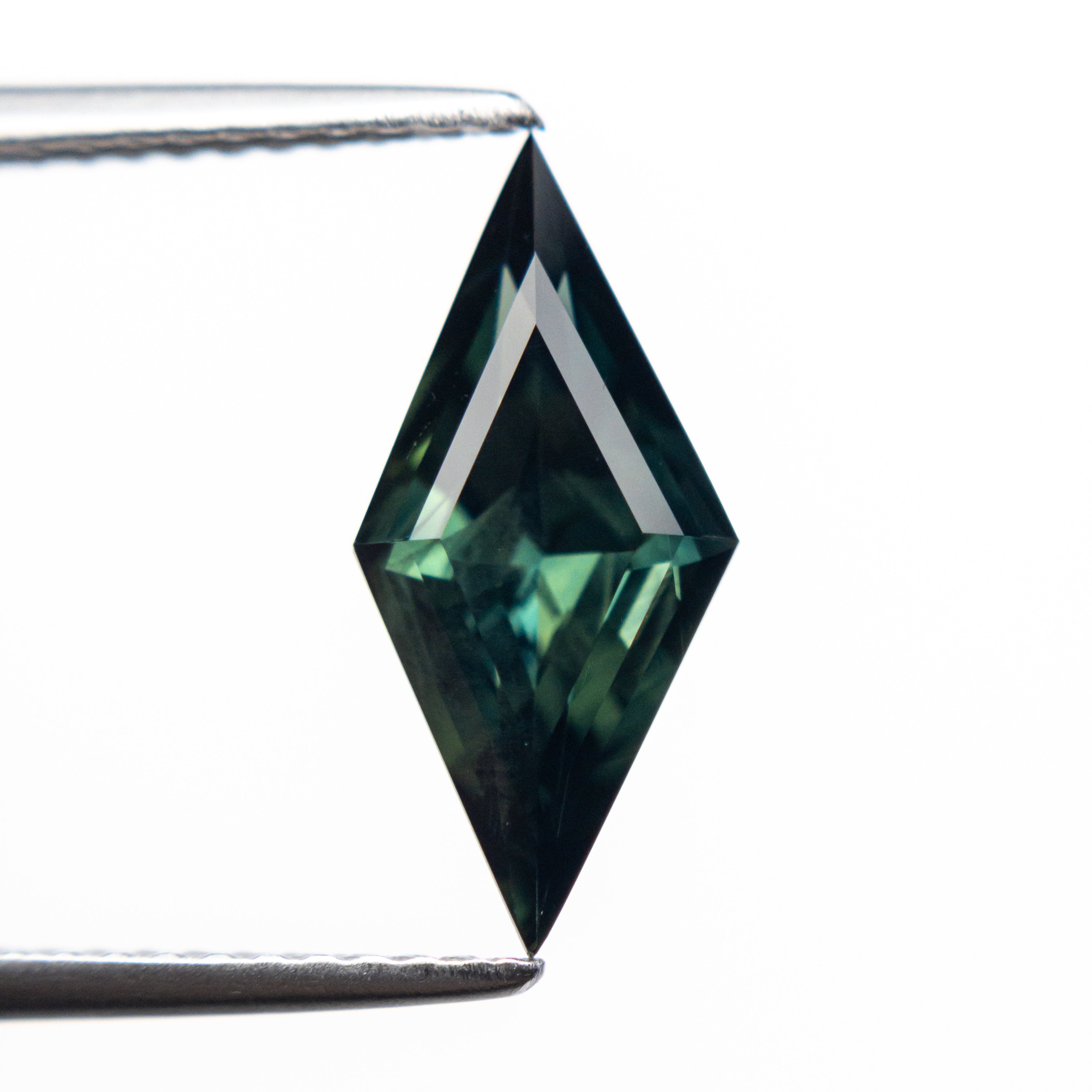 1.85ct 13.82x6.43x4.23mm Lozenge Step Cut Sapphire 22289-01-Staghead Designs