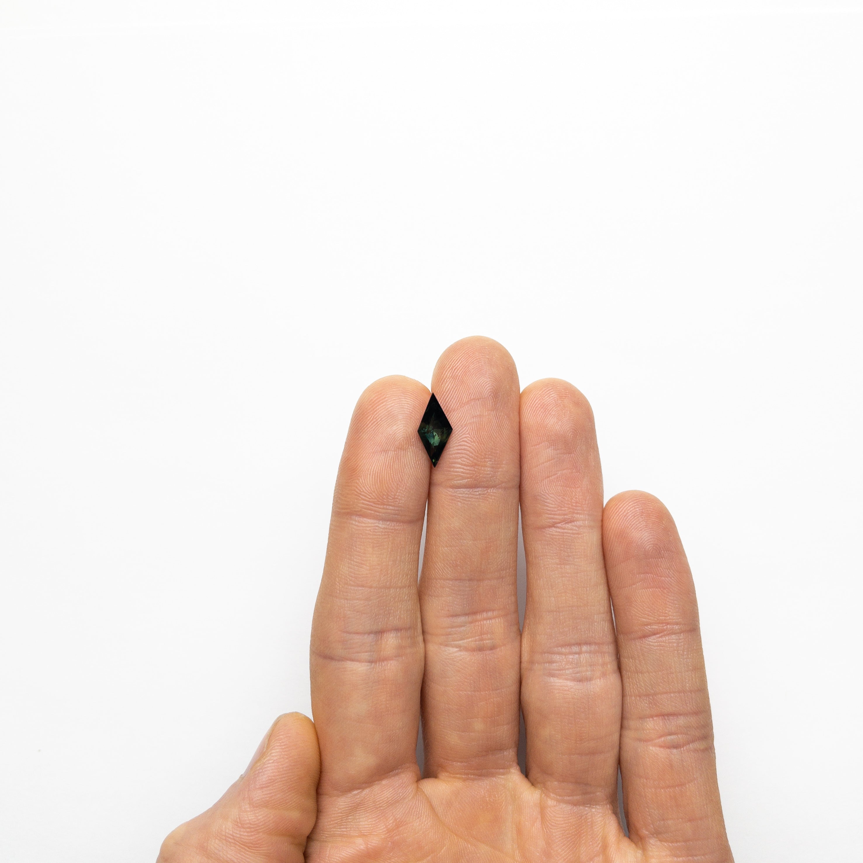 1.85ct 13.82x6.43x4.23mm Lozenge Step Cut Sapphire 22289-01-Staghead Designs