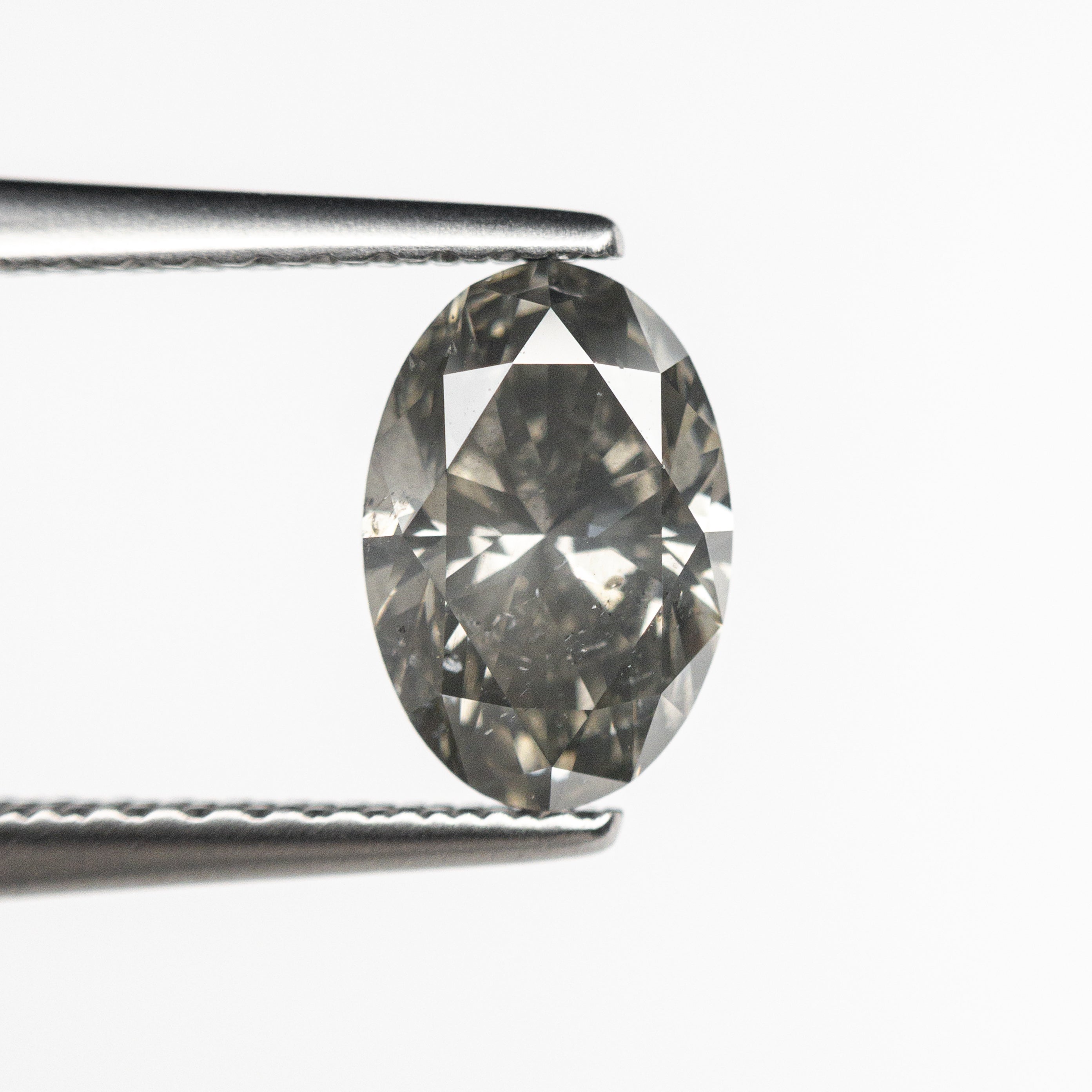 1.01ct 7.77x5.22x3.56mm Fancy Grey Oval Brilliant 19546-01-Staghead Designs