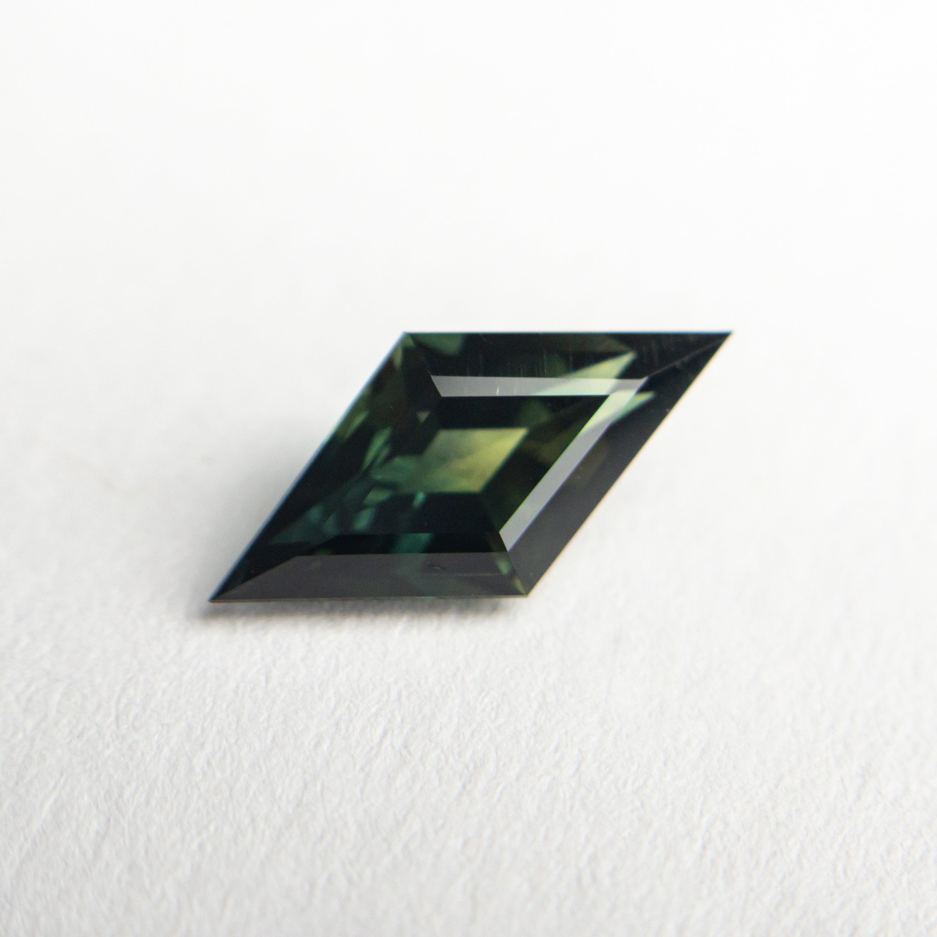 1.36ct 11.94x5.89x3.61mm Lozenge Step Cut Sapphire 22766-02-Staghead Designs