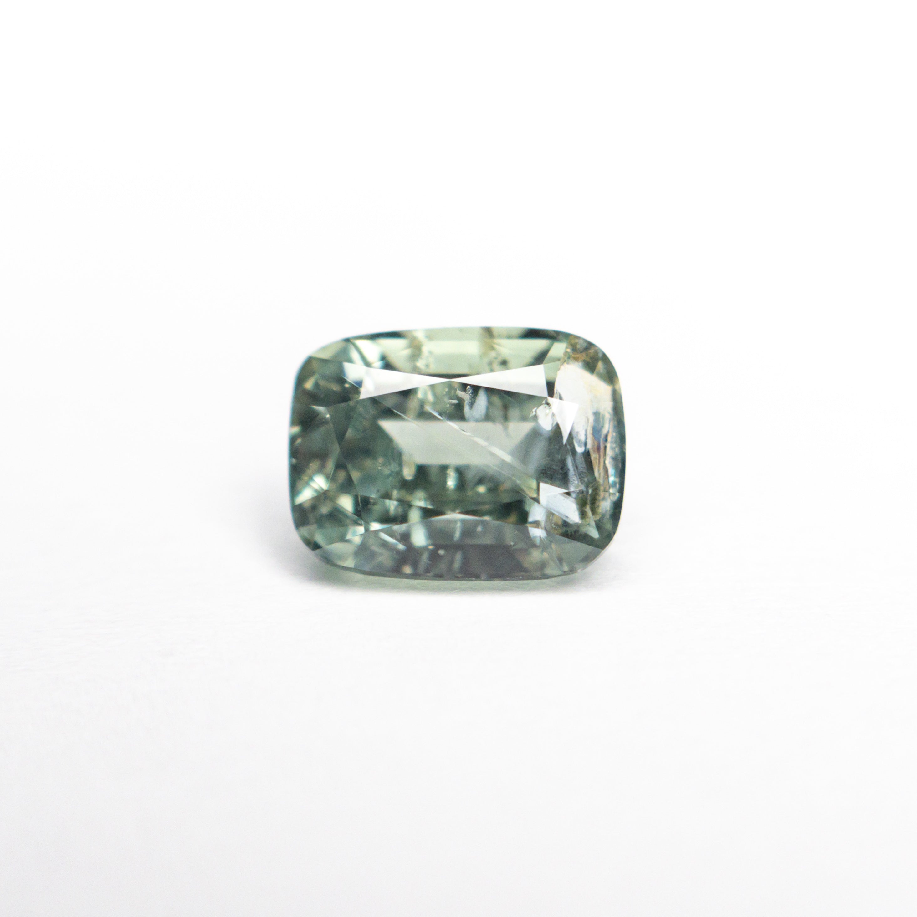 1.52ct 6.89x5.24x4.26mm Cushion Brilliant Sapphire 24173-01-Staghead Designs