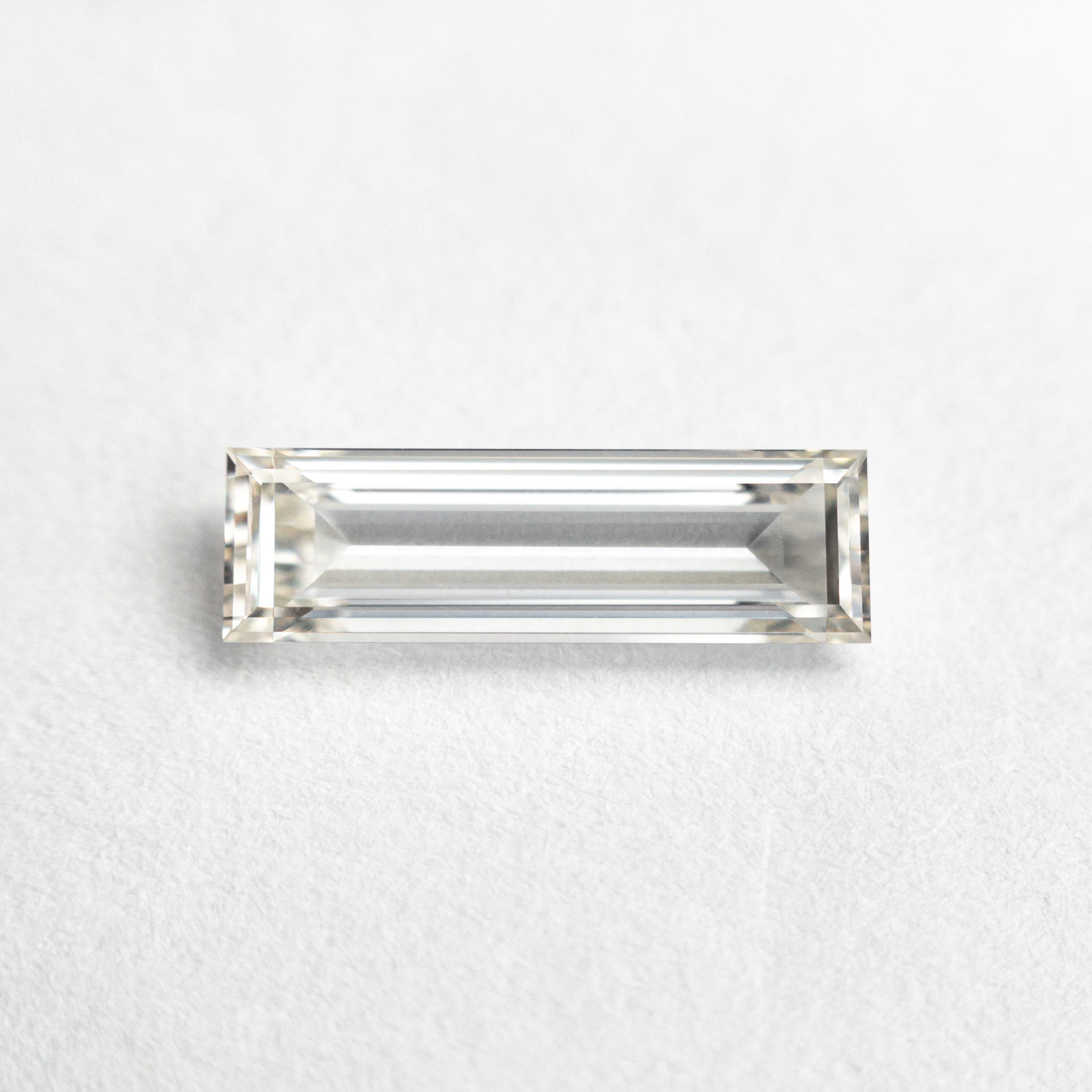 0.71ct 10.48x3.17x1.86mm GIA Internally Flawless I Baguette Step Cut 24302-01-Staghead Designs