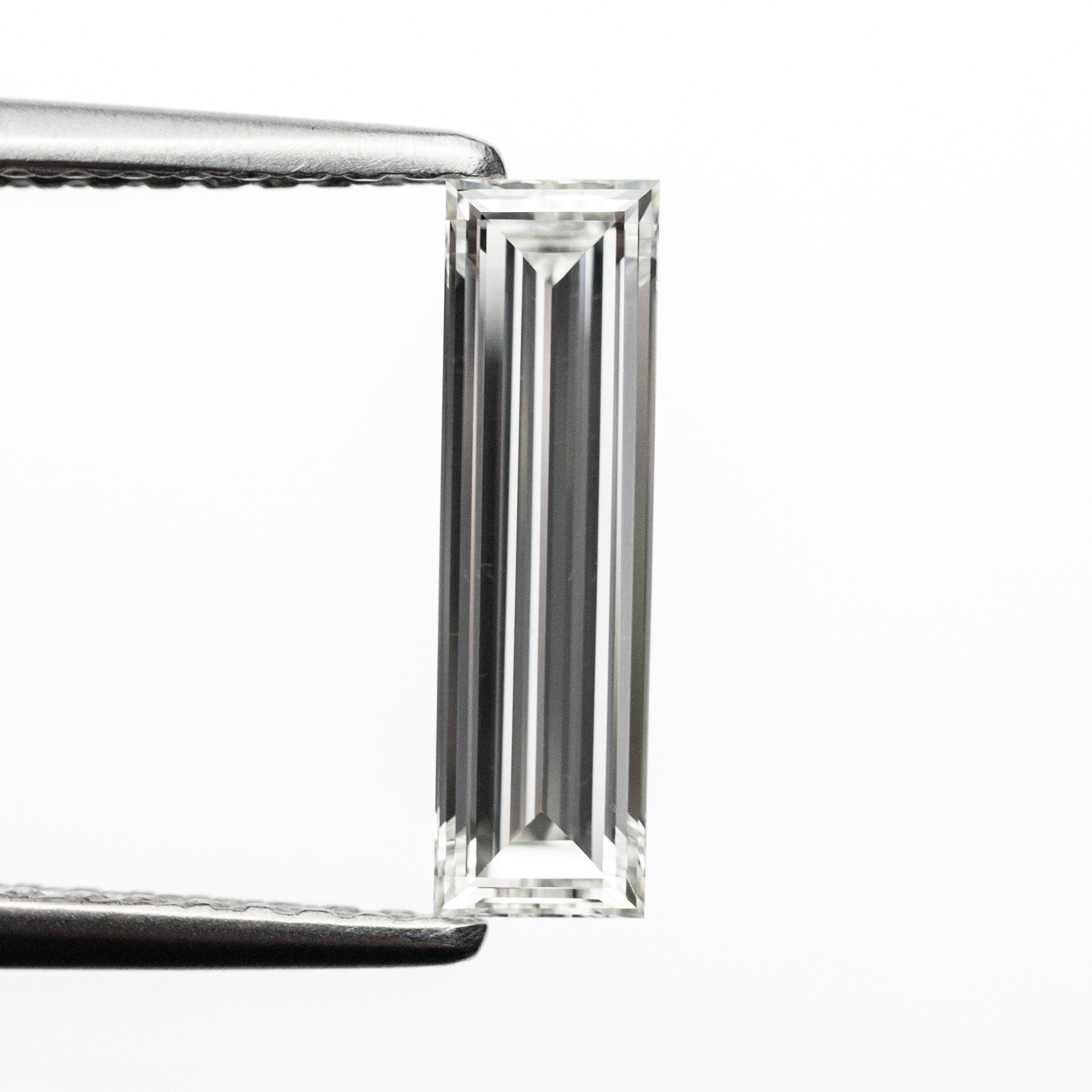 0.78ct 11.17x3.24x2.06mm GIA VS2 H Baguette Step Cut 24303-01-Staghead Designs