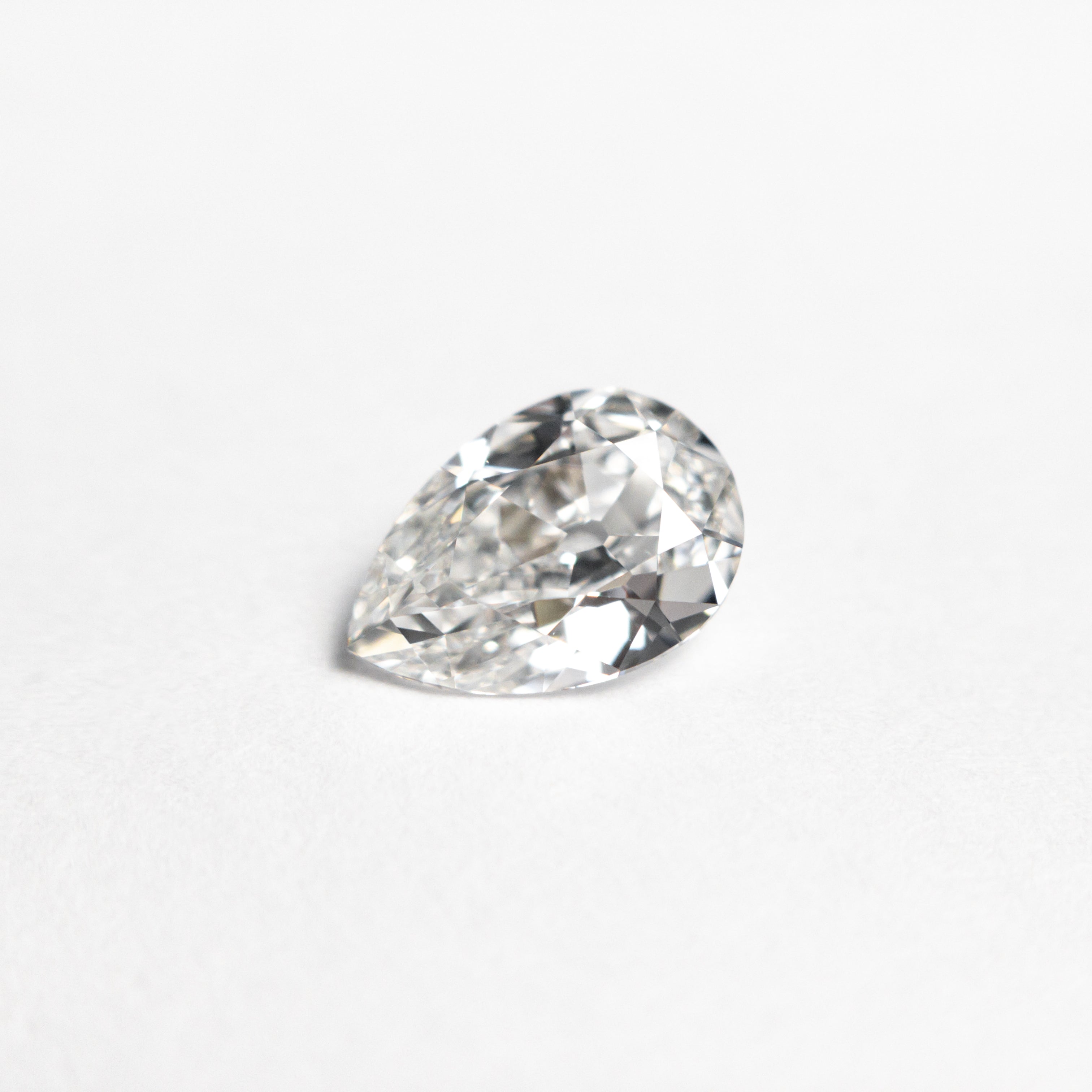 0.71ct 7.35x5.03x2.77mm GIA VVS1 F Pear Brilliant 24447-01-Staghead Designs