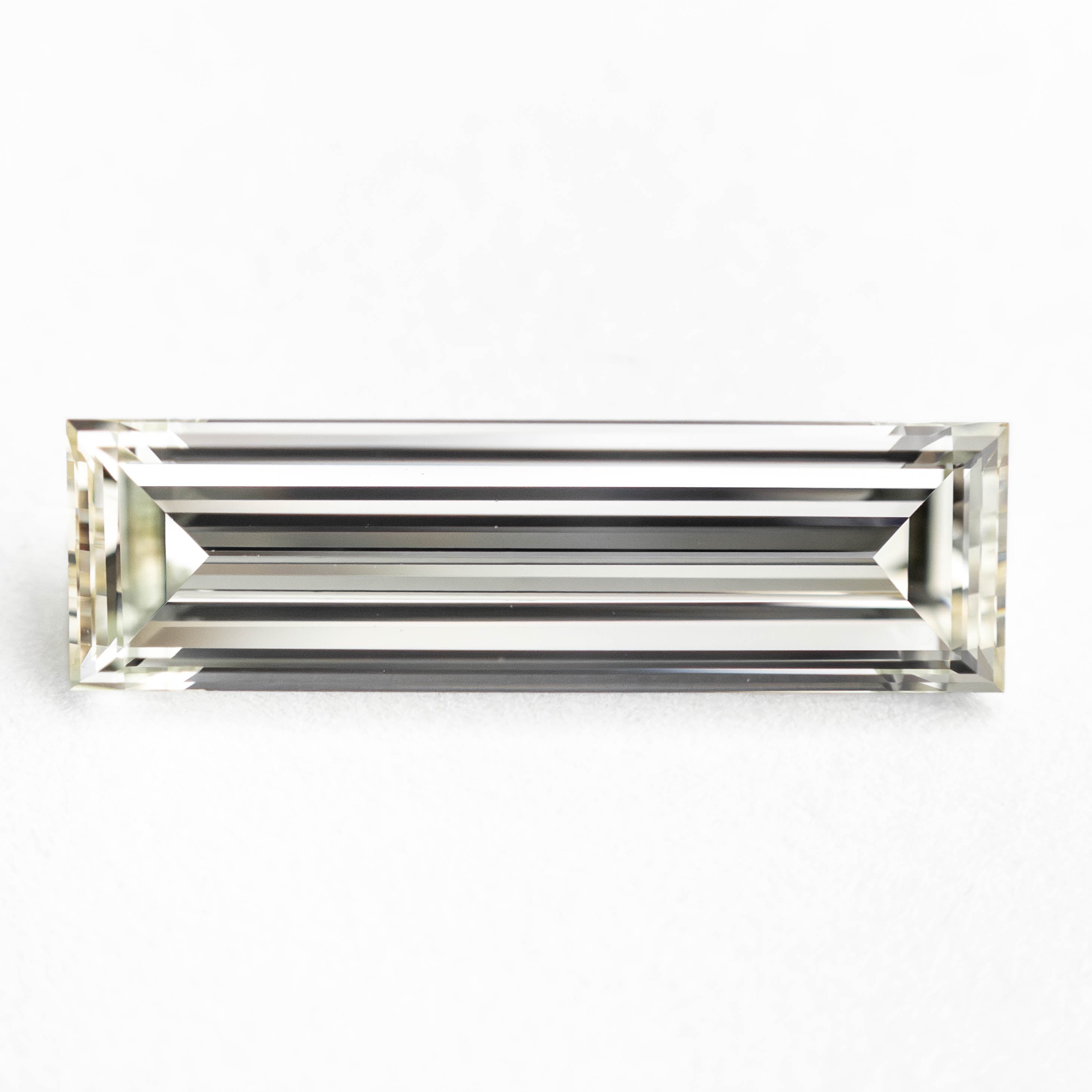 1.31ct 13.12x3.81x2.38mm VS1 L-M Baguette Step Cut 24700-01-Staghead Designs