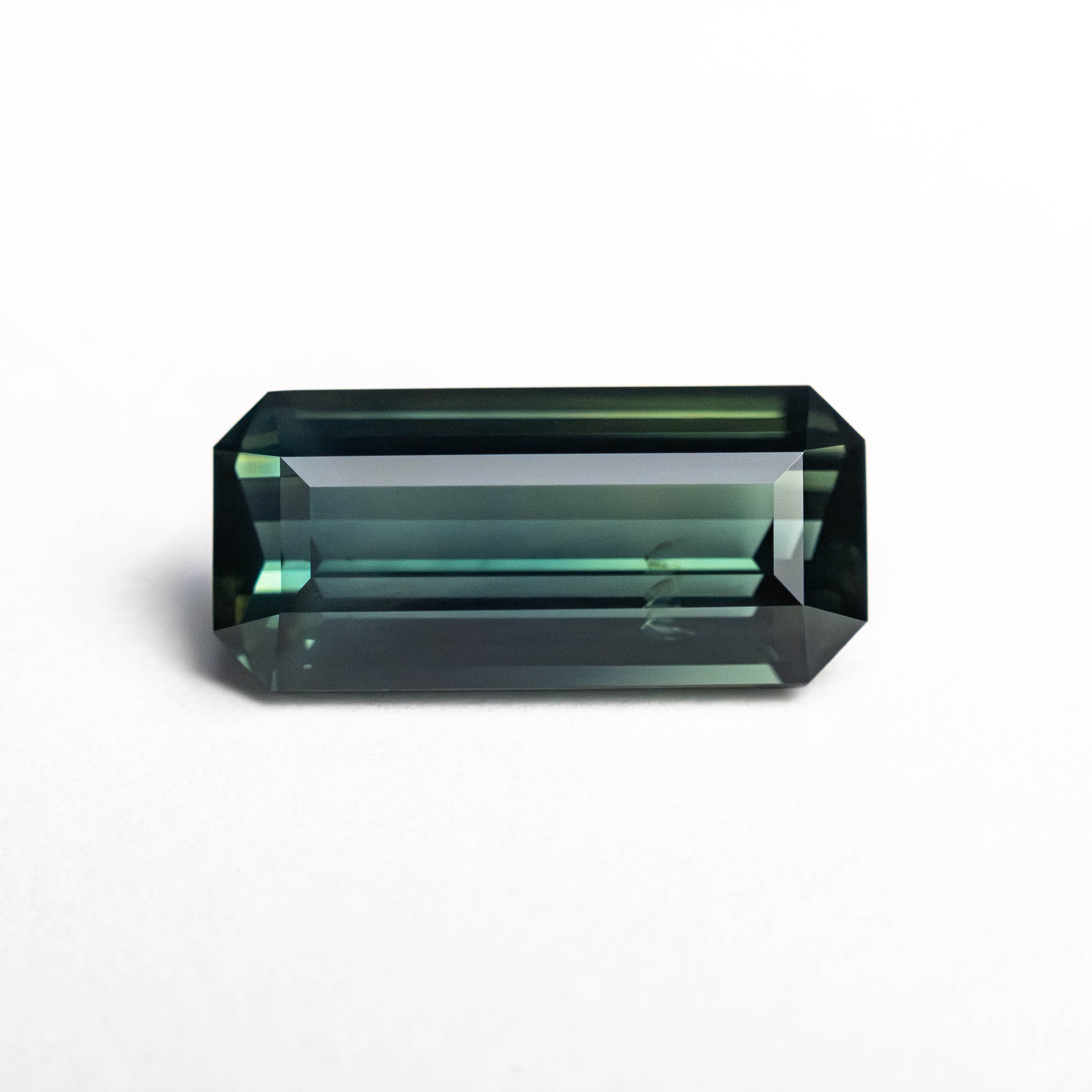 1.68ct 10.02x4.66x3.24mm Cut Corner Rectangle Step Cut Sapphire 25194-03-Staghead Designs