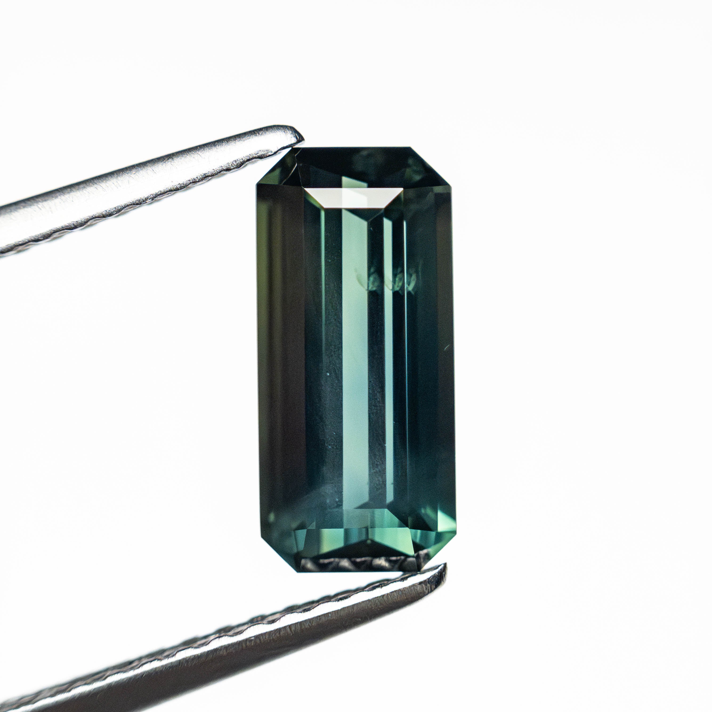 1.68ct 10.02x4.66x3.24mm Cut Corner Rectangle Step Cut Sapphire 25194-03-Staghead Designs