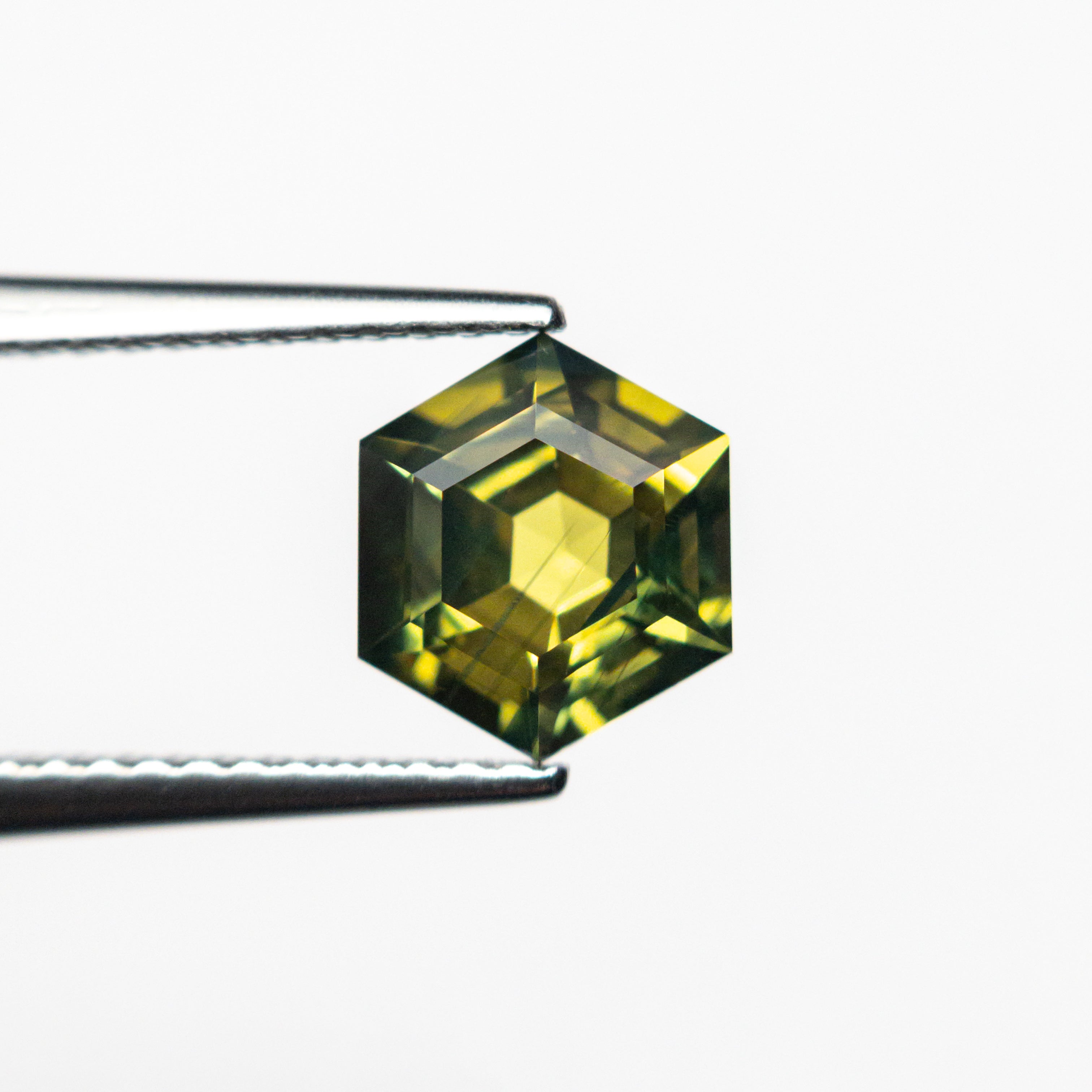 1.52ct 7.57x6.56x4.18mm Hexagon Step Cut Sapphire 25384-03-Staghead Designs