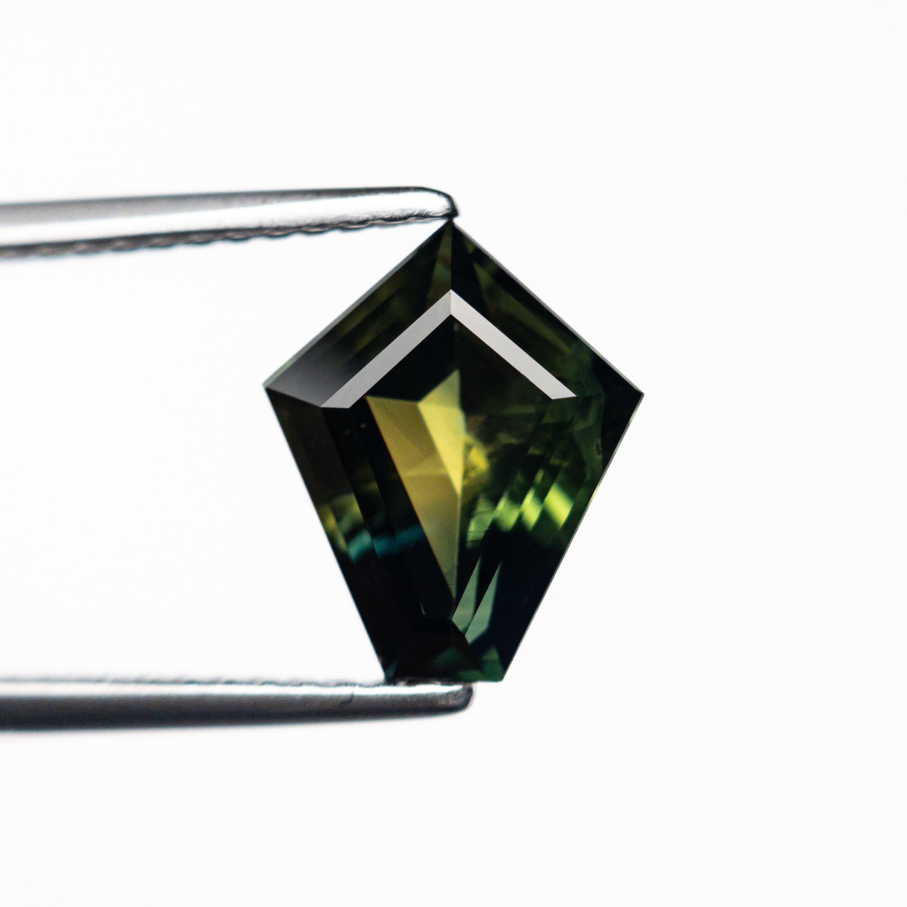 2.28ct 9.93x8.31x4.51mm Shield Step Cut Sapphire 25388-01-Staghead Designs