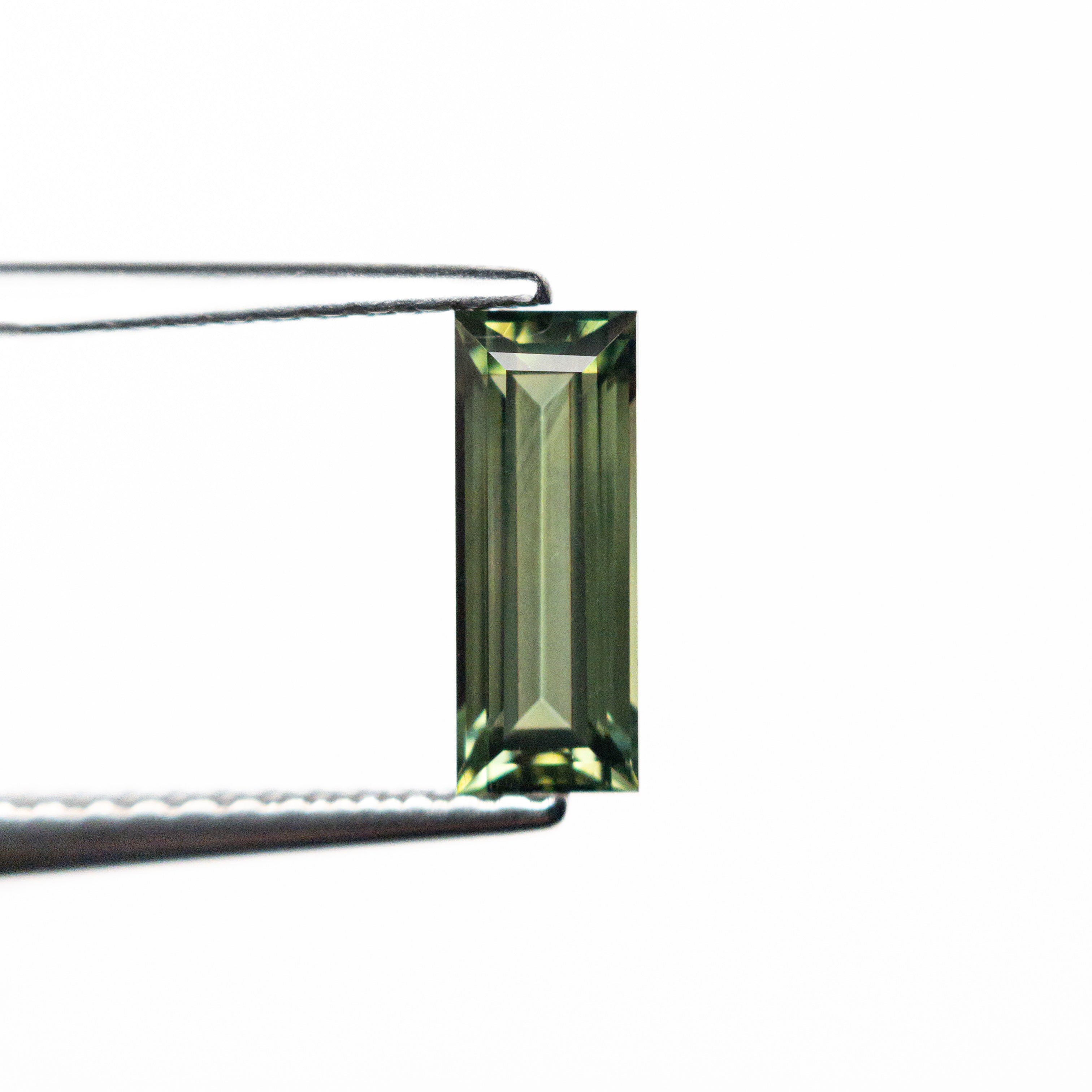 0.85ct 8.45x3.22x2.61mm Rectangle Step Cut Sapphire 25740-03-Staghead Designs