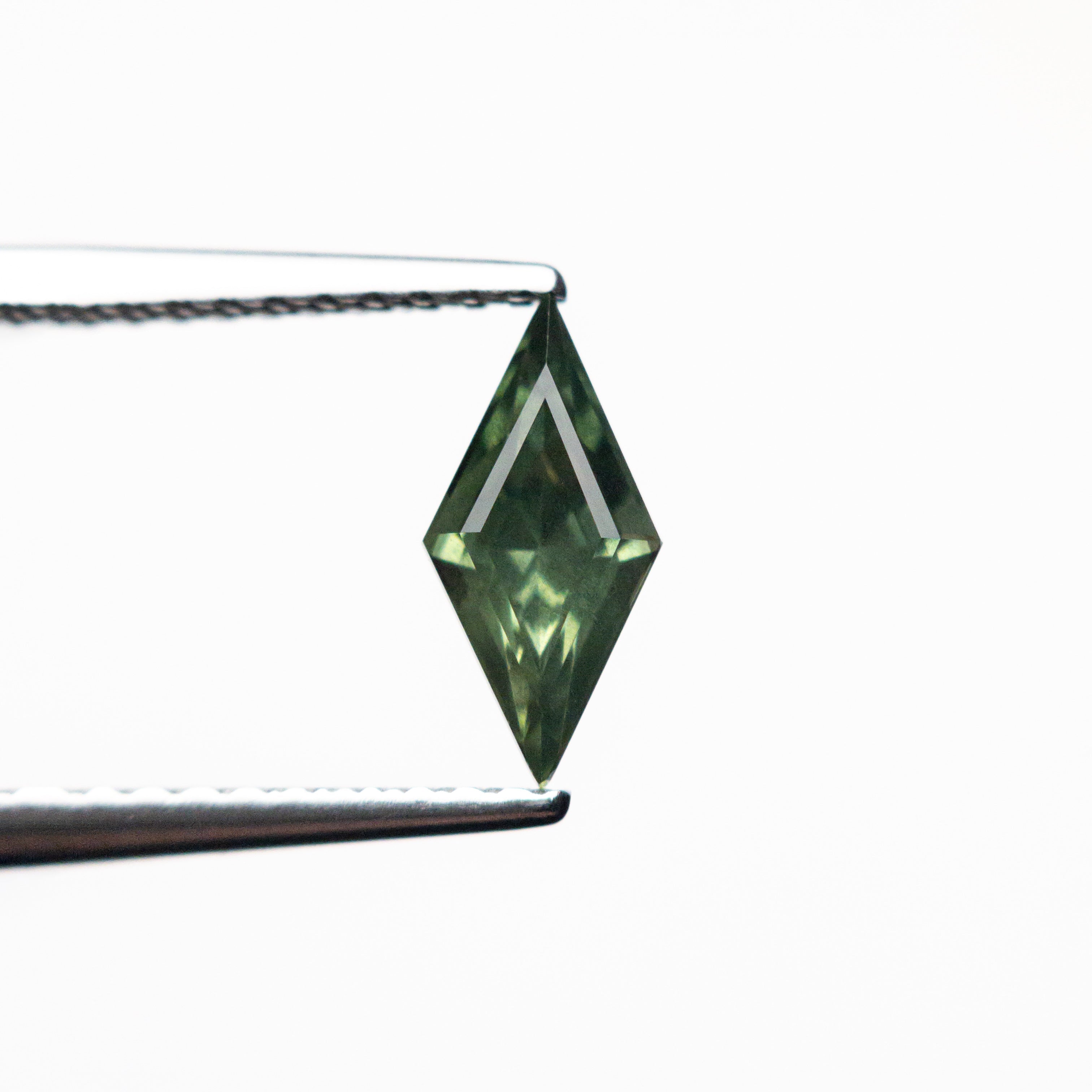 0.62ct 8.76x4.28x3.13mm Lozenge Step Cut Sapphire 25740-04-Staghead Designs