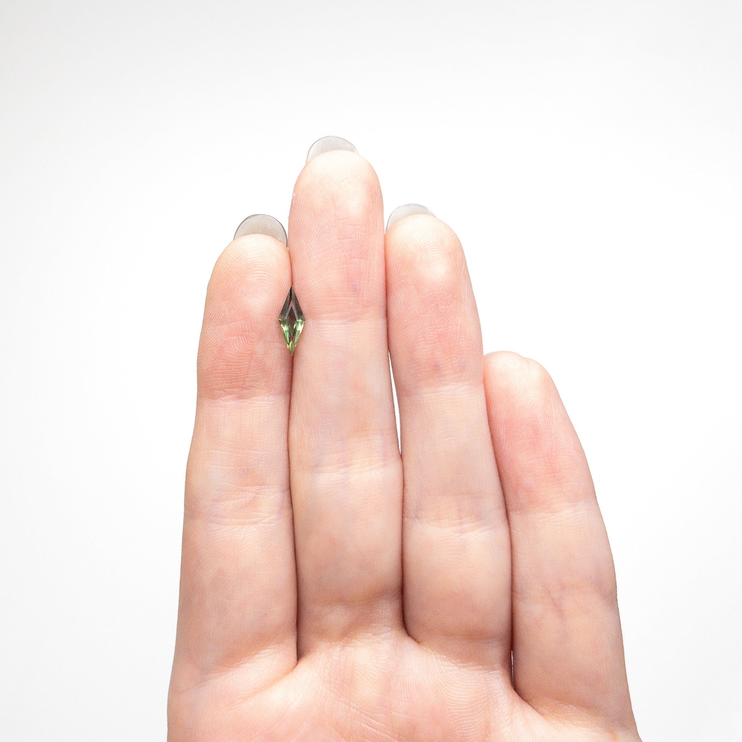 0.51ct 9.97x3.79x2.39mm Lozenge Step Cut Sapphire 25740-11-Staghead Designs