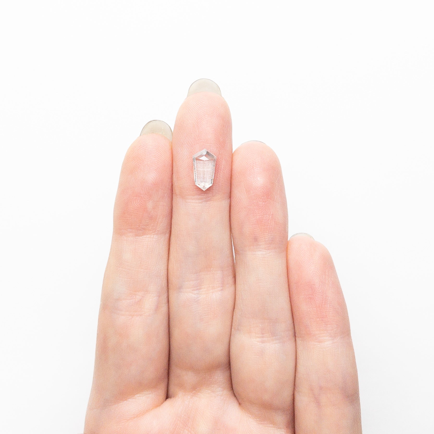 1.47ct 9.65x5.40x3.34mm Shield Step Cut 25807-34-Staghead Designs