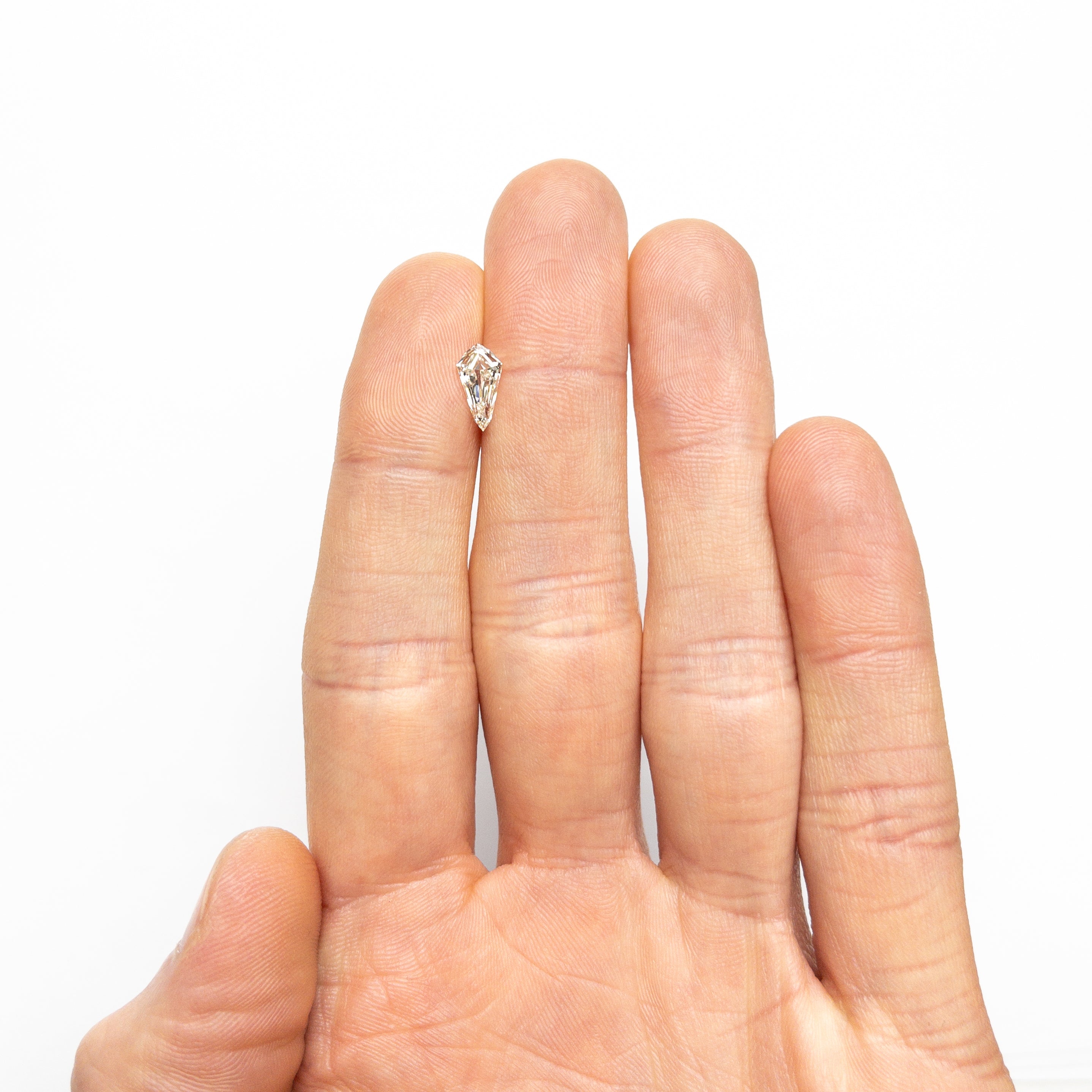 0.91ct 9.95x5.23x2.88mm SI1 K Shield Step Cut 25955-01-Staghead Designs