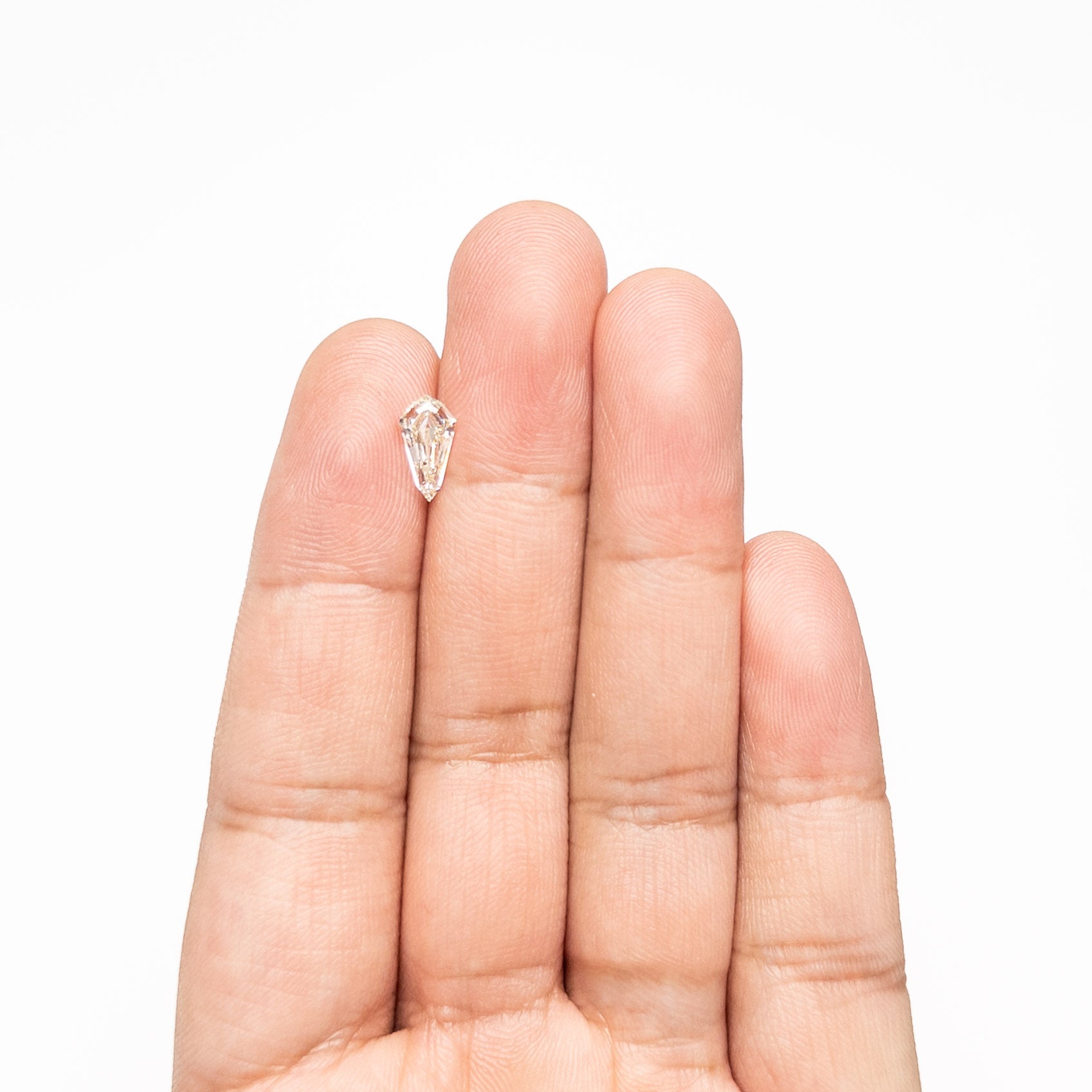 1.02ct 10.15x5.35x3.01mm VVS2 M-N Shield Step Cut 25957-01-Staghead Designs