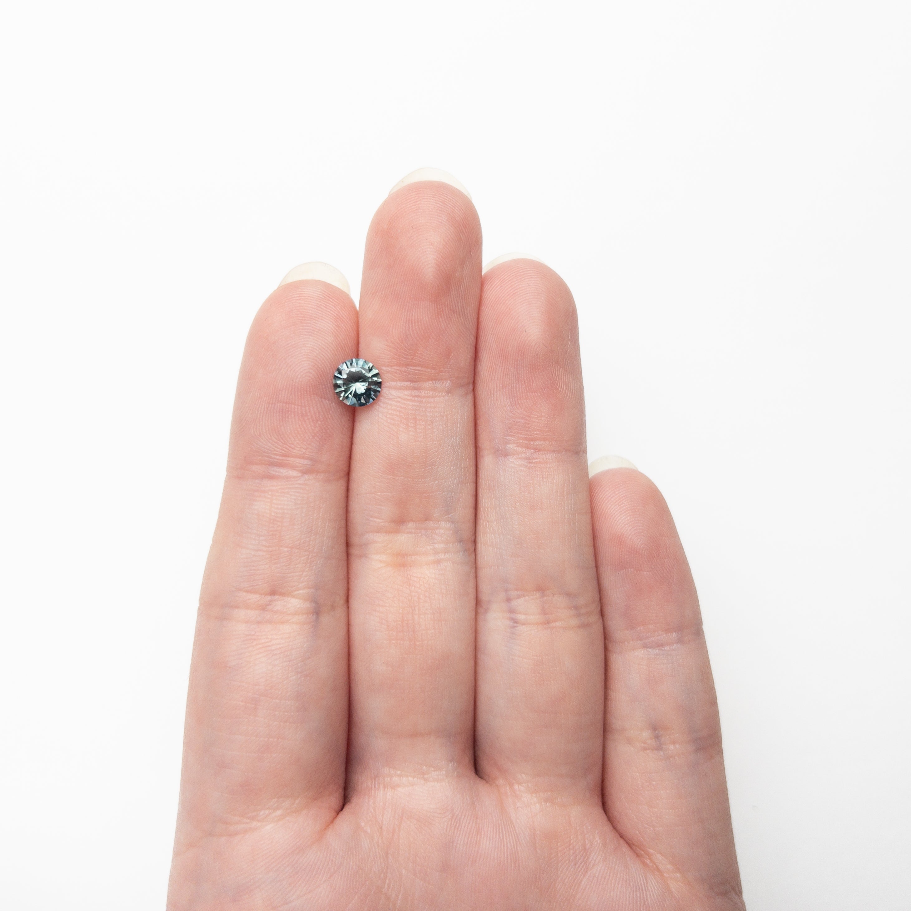 1.04ct 6.10x6.07x3.89mm Round Brilliant Sapphire 26141-25-Staghead Designs