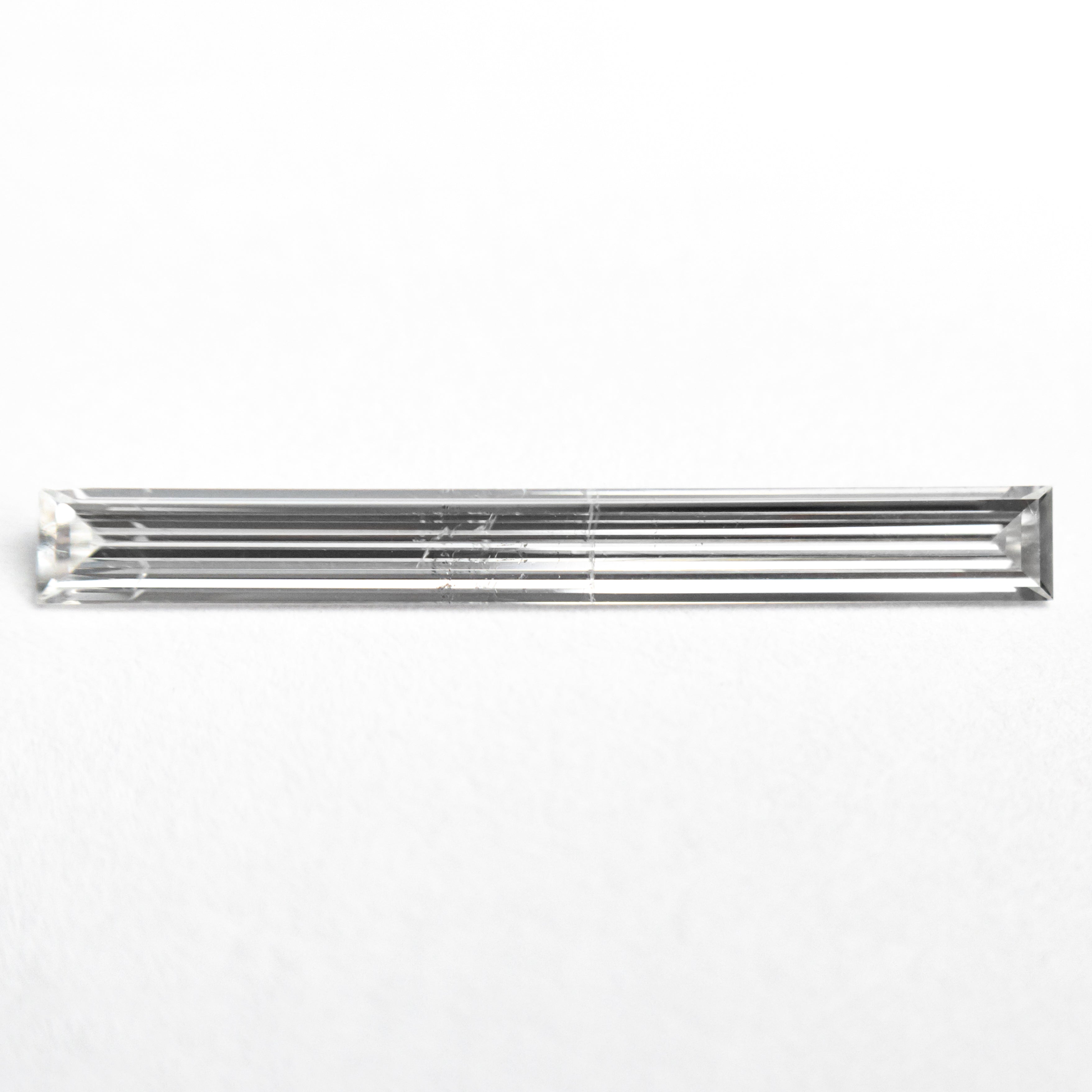 0.52ct 19.44x2.17x1.09mm SI2 E Baguette Step Cut 26545-01-Staghead Designs