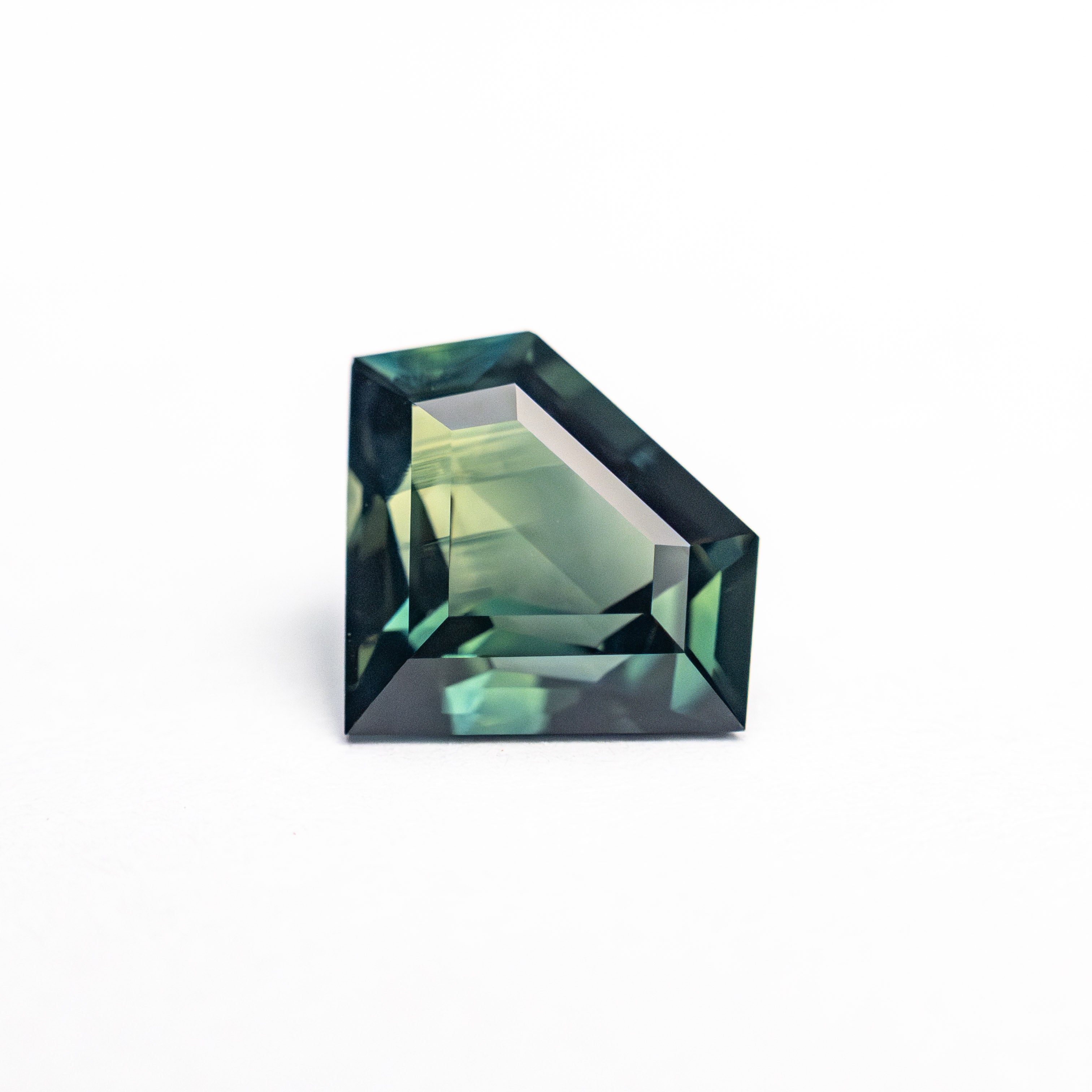 1.30ct 6.72x8.55x3.80mm Shield Step Cut Sapphire 26724-01-Staghead Designs