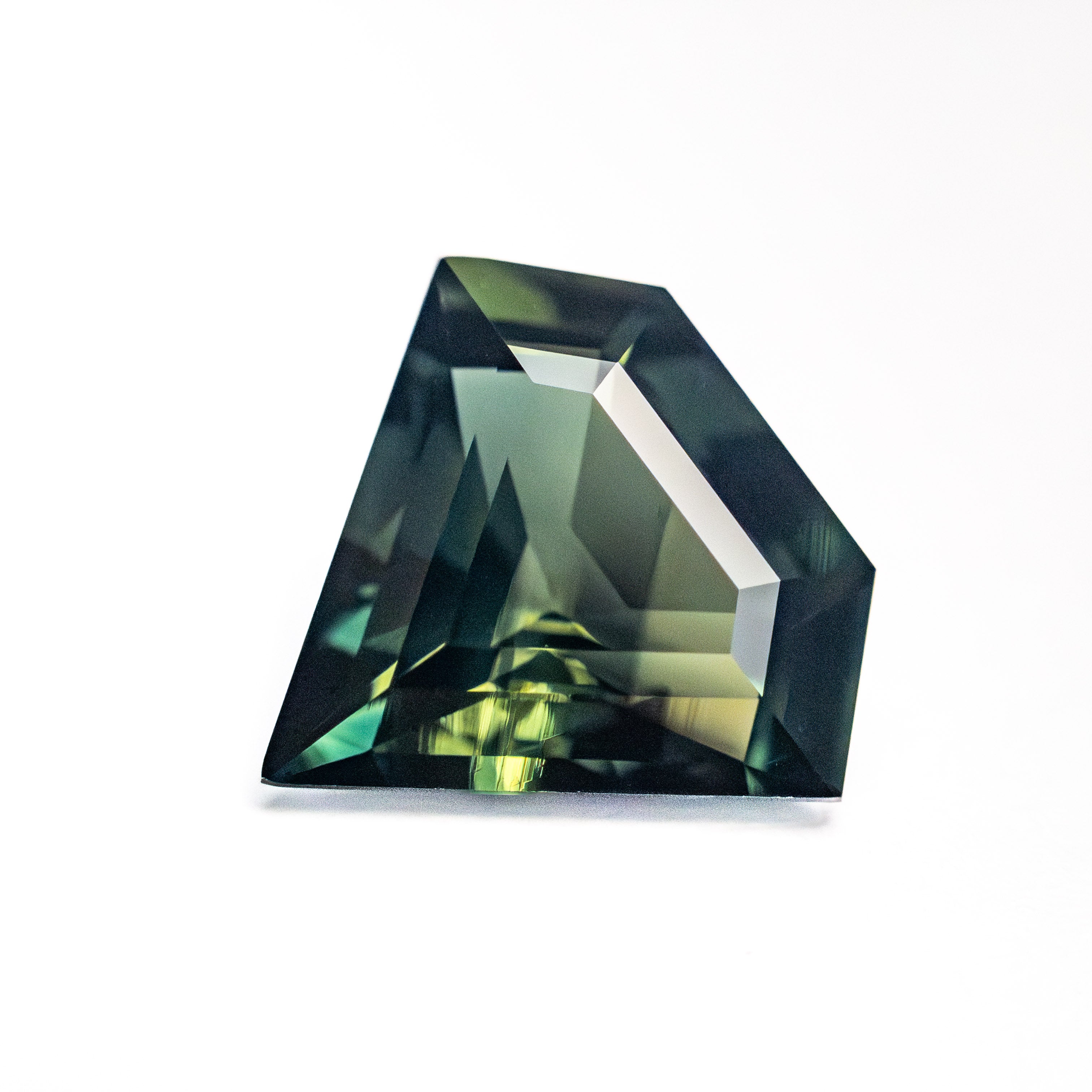 2.84ct 9.76x10.81x4.72mm Shield Step Cut Sapphire 26727-01-Staghead Designs