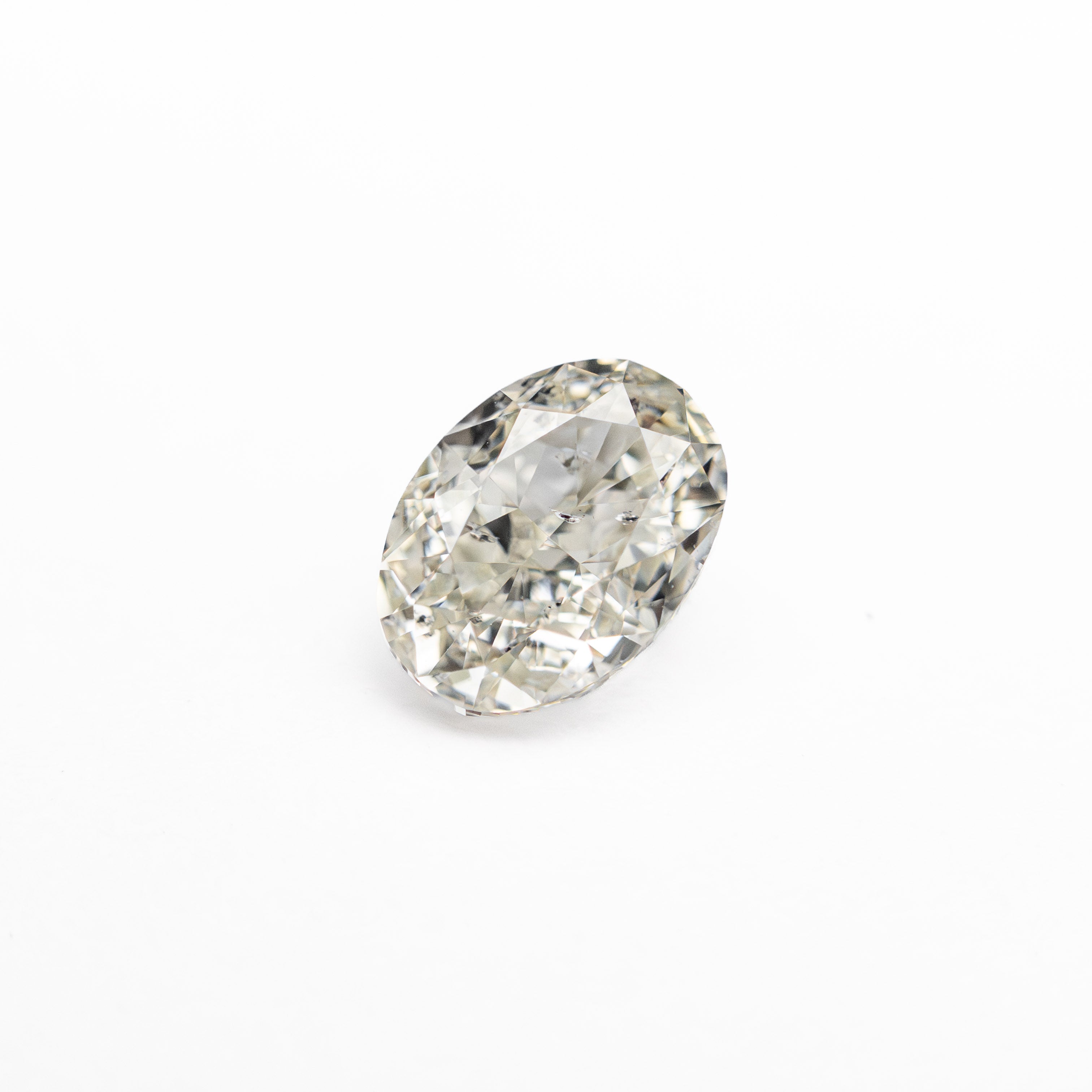 0.70ct 6.09x4.50x3.04mm SI2 K Oval Brilliant 27065-05-Staghead Designs