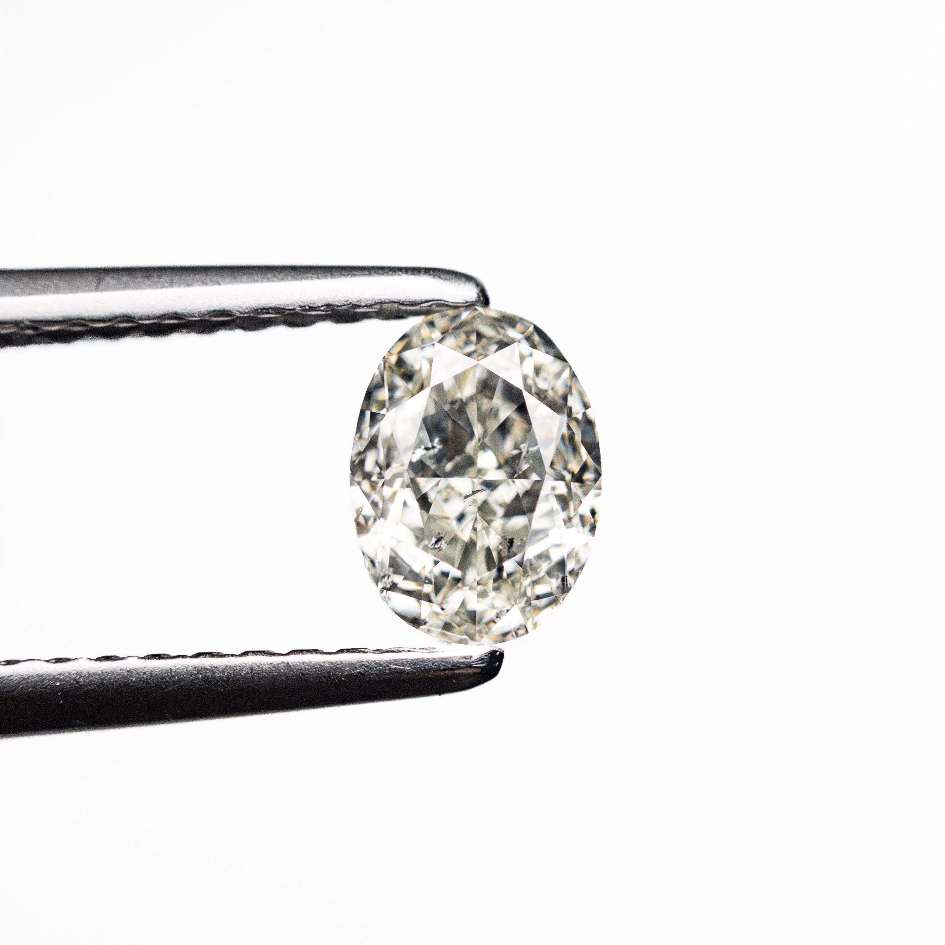 0.70ct 6.09x4.50x3.04mm SI2 K Oval Brilliant 27065-05-Staghead Designs