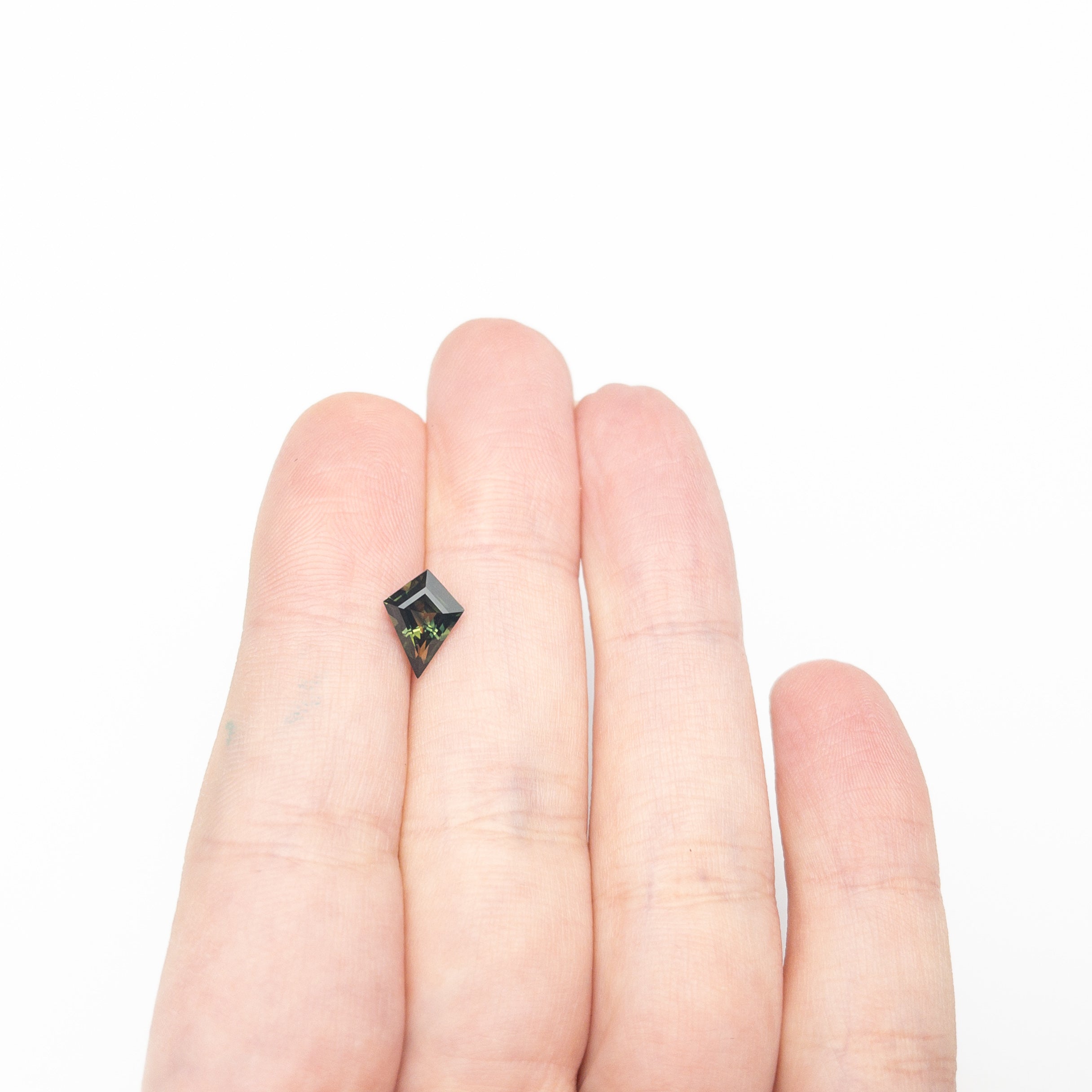 1.24ct 9.52x6.20x3.61mm Kite Step Cut Sapphire 27326-02-Staghead Designs