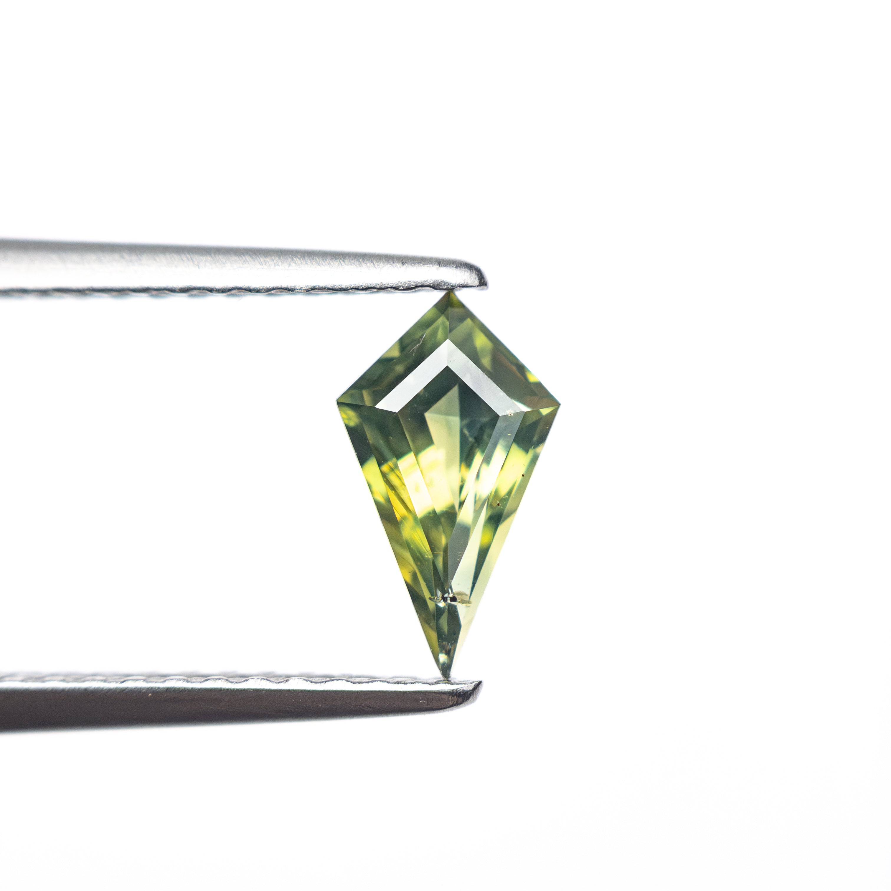 0.60ct 8.29x4.45x3.00mm Kite Step Cut Sapphire 27336-17-Staghead Designs
