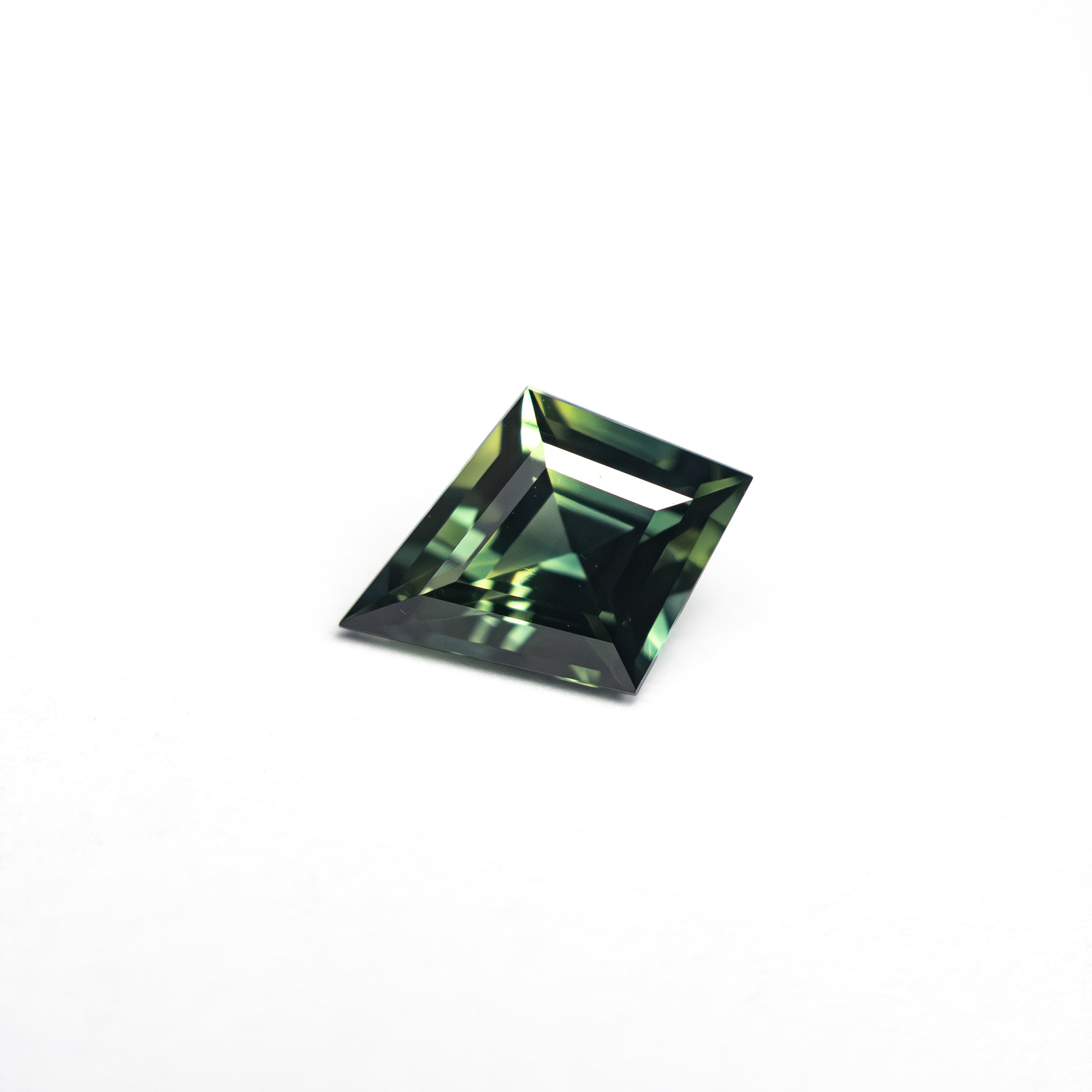 0.66ct 7.66x4.86x3.08mm Kite Step Cut Sapphire 27336-24-Staghead Designs