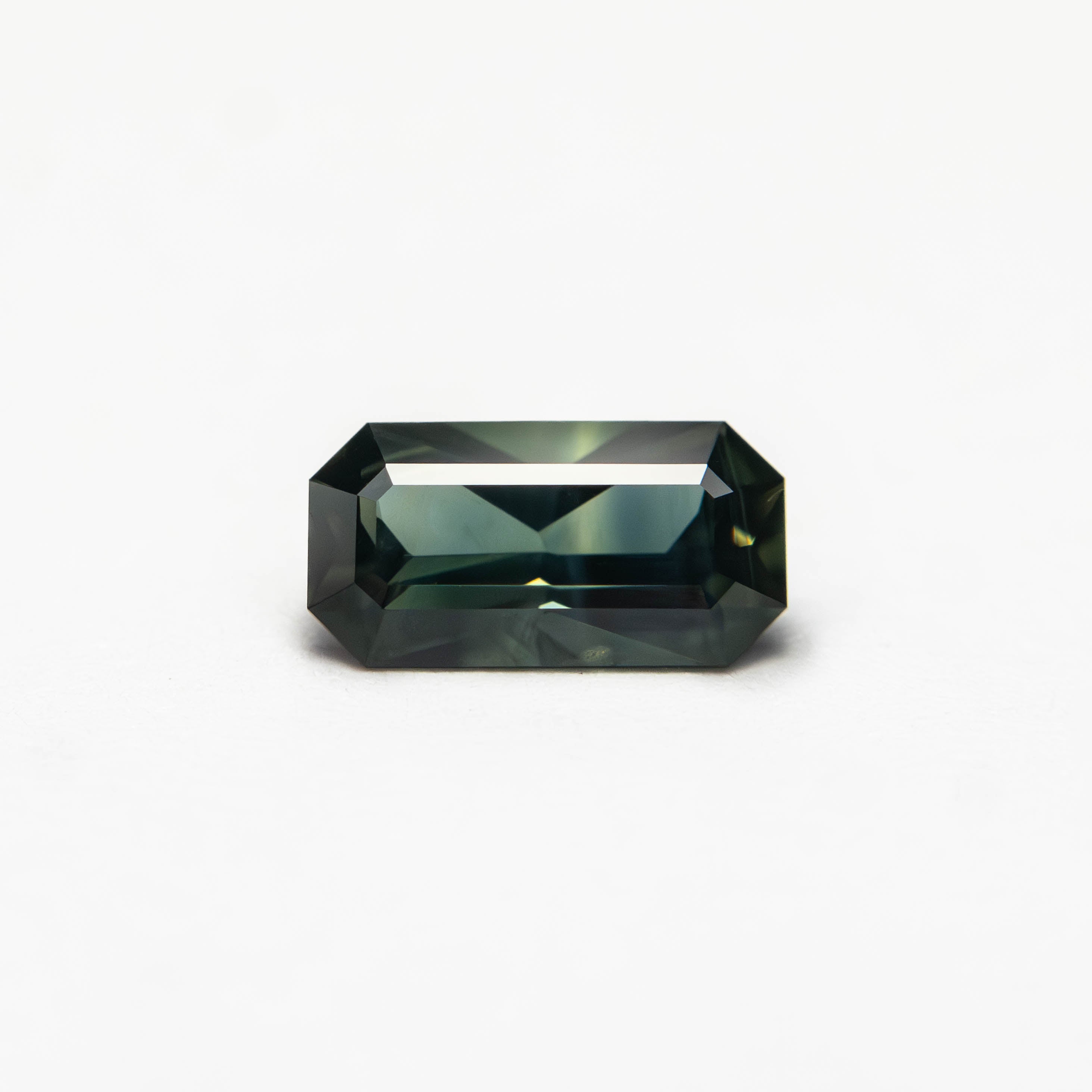 0.60ct 6.93x3.63x2.58mm Cut Corner Rectangle Step Cut Sapphire 27336-39-Staghead Designs