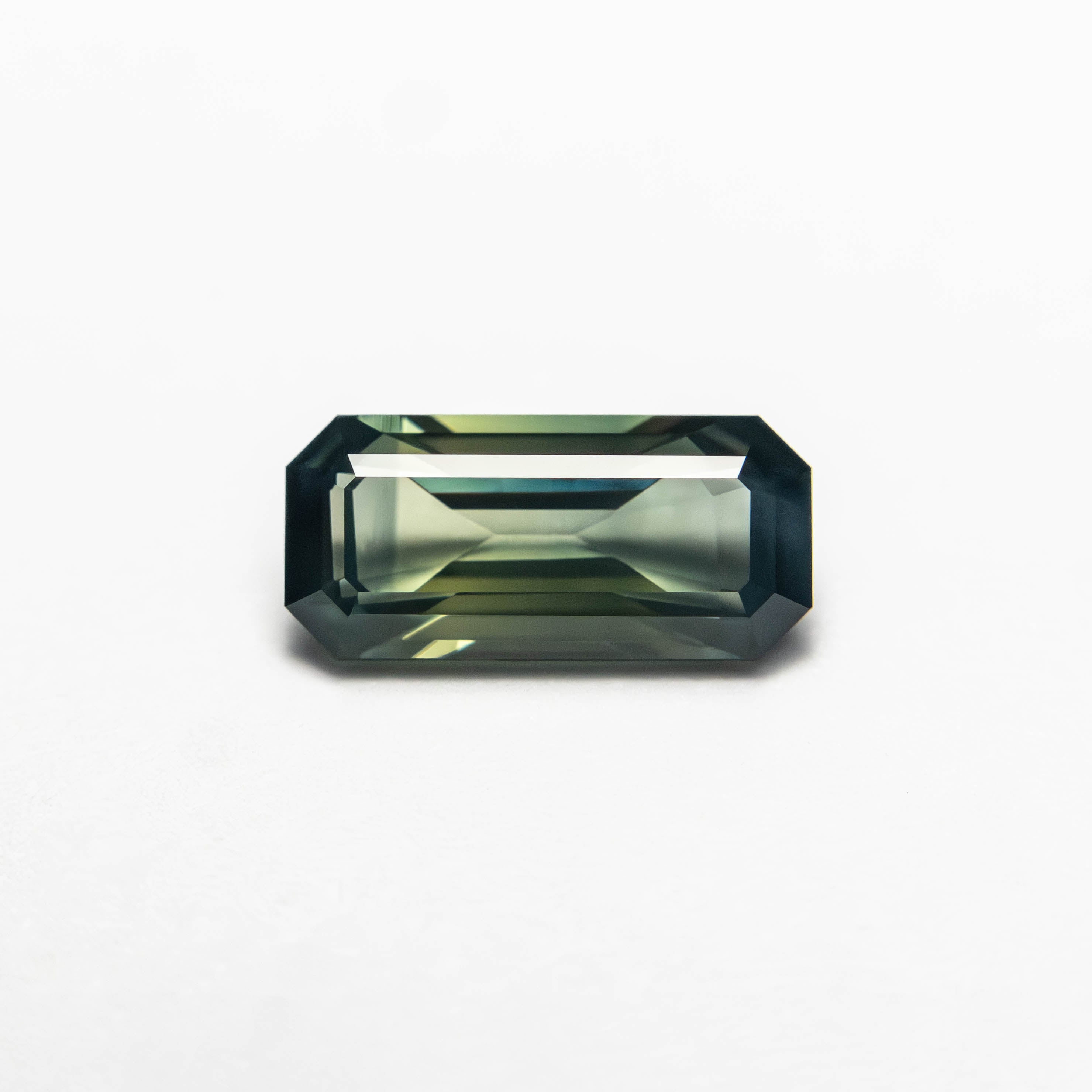 0.71ct 7.78x3.64x2.46mm Cut Corner Rectangle Step Cut Sapphire 27336-53-Staghead Designs