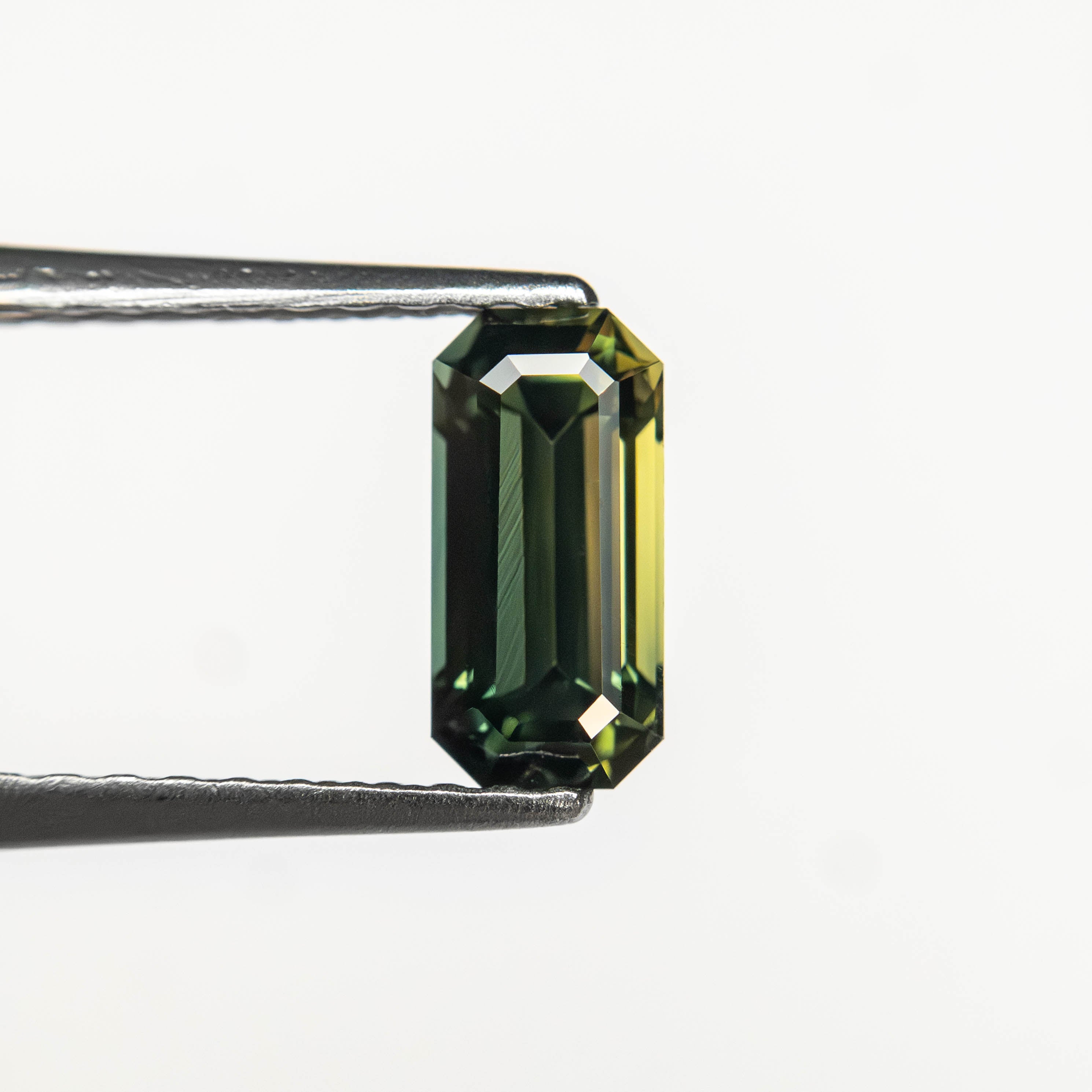 0.82ct 7.17x3.48x3.18mm Cut Corner Rectangle Step Cut Sapphire 27336-57-Staghead Designs