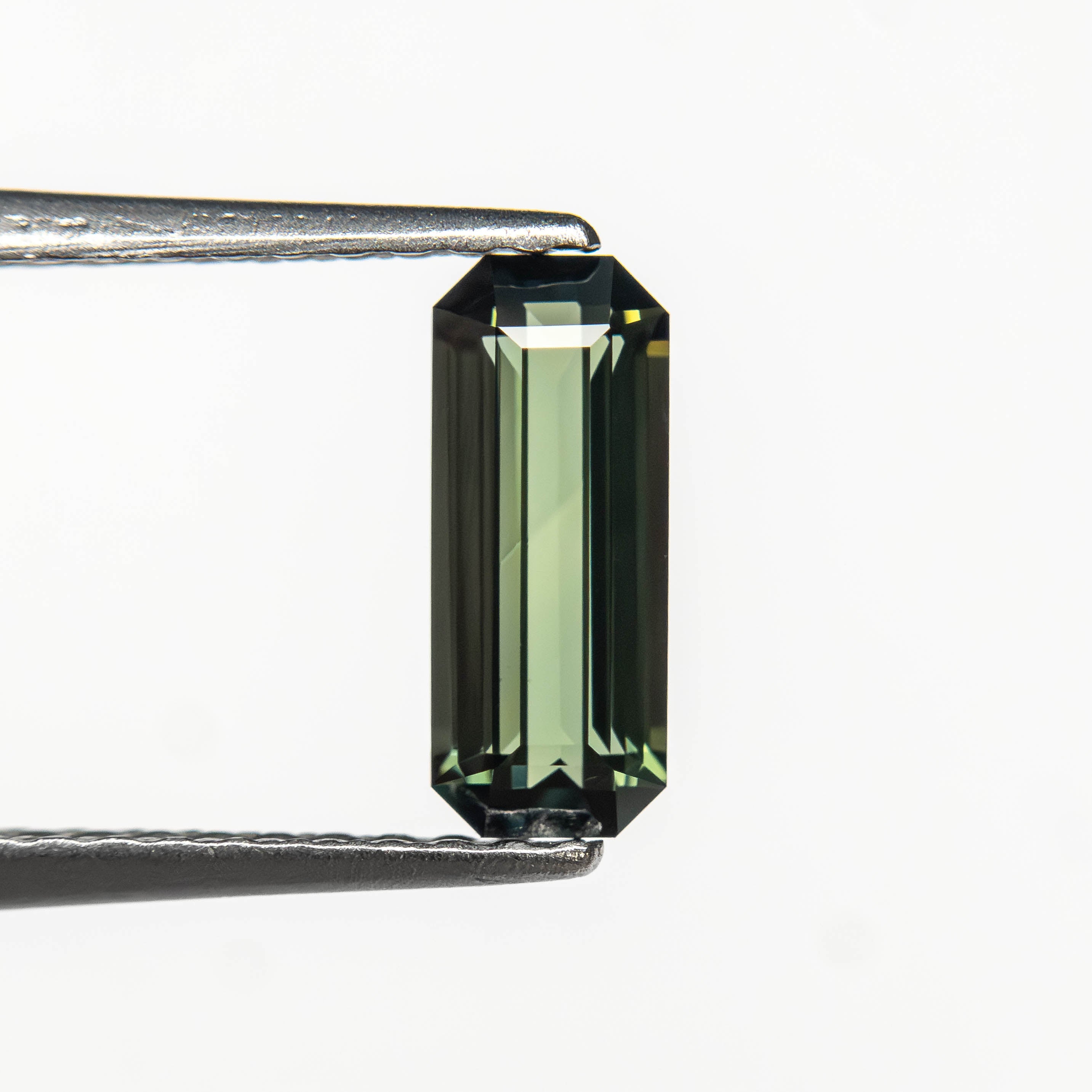 0.77ct 8.35x3.41x2.50mm Cut Corner Rectangle Step Cut Sapphire 27336-58-Staghead Designs
