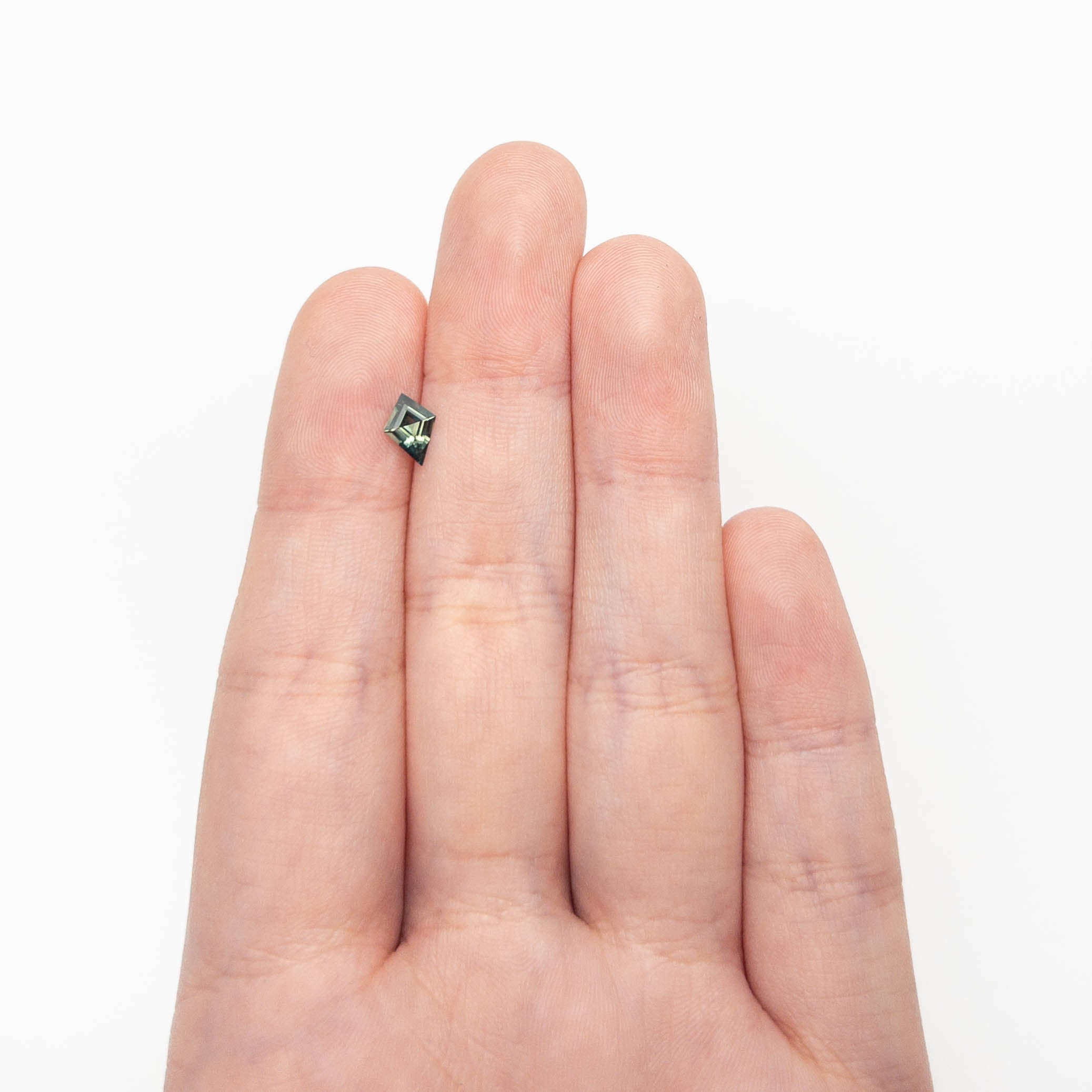 0.54ct 7.68x5.44x2.64mm Kite Step Cut Sapphire 27363-14-Staghead Designs