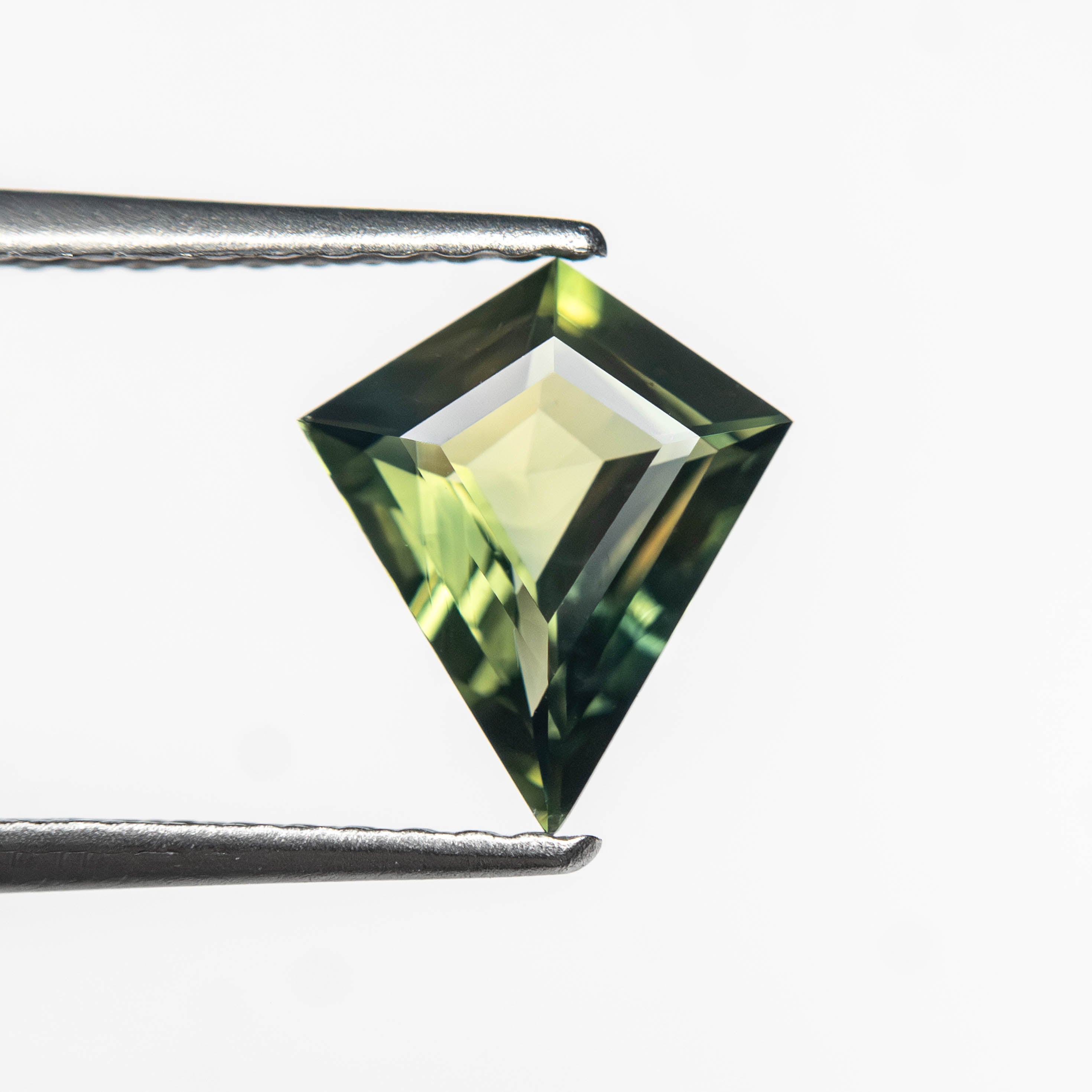 0.85ct 8.47x7.22x2.84mm Kite Step Cut Sapphire 27363-19-Staghead Designs