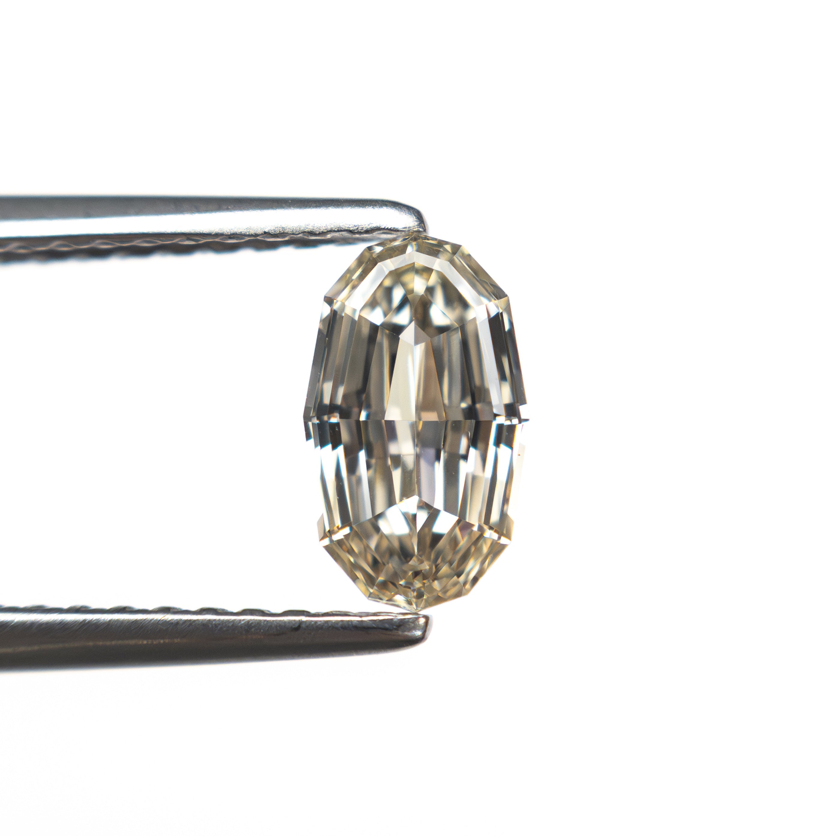 0.70ct 7.61x4.49x2.46mm VS2 O-P Geo Oval Step Cut 🇿🇦 27526-01-Staghead Designs