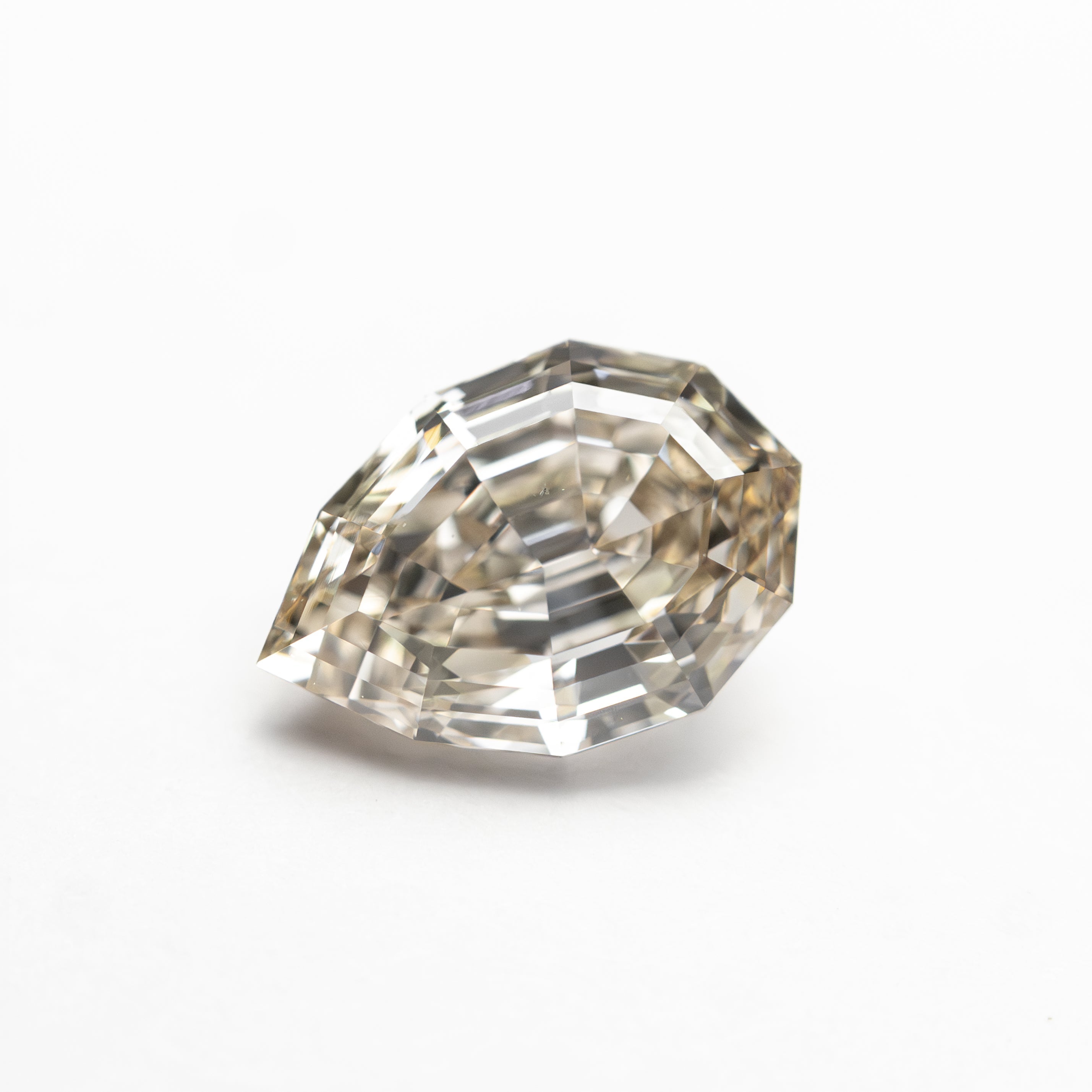 1.30ct 8.27x5.66x3.99mm SI1 Q-R Geo Pear Step Cut 🇨🇦 27579-01-Staghead Designs