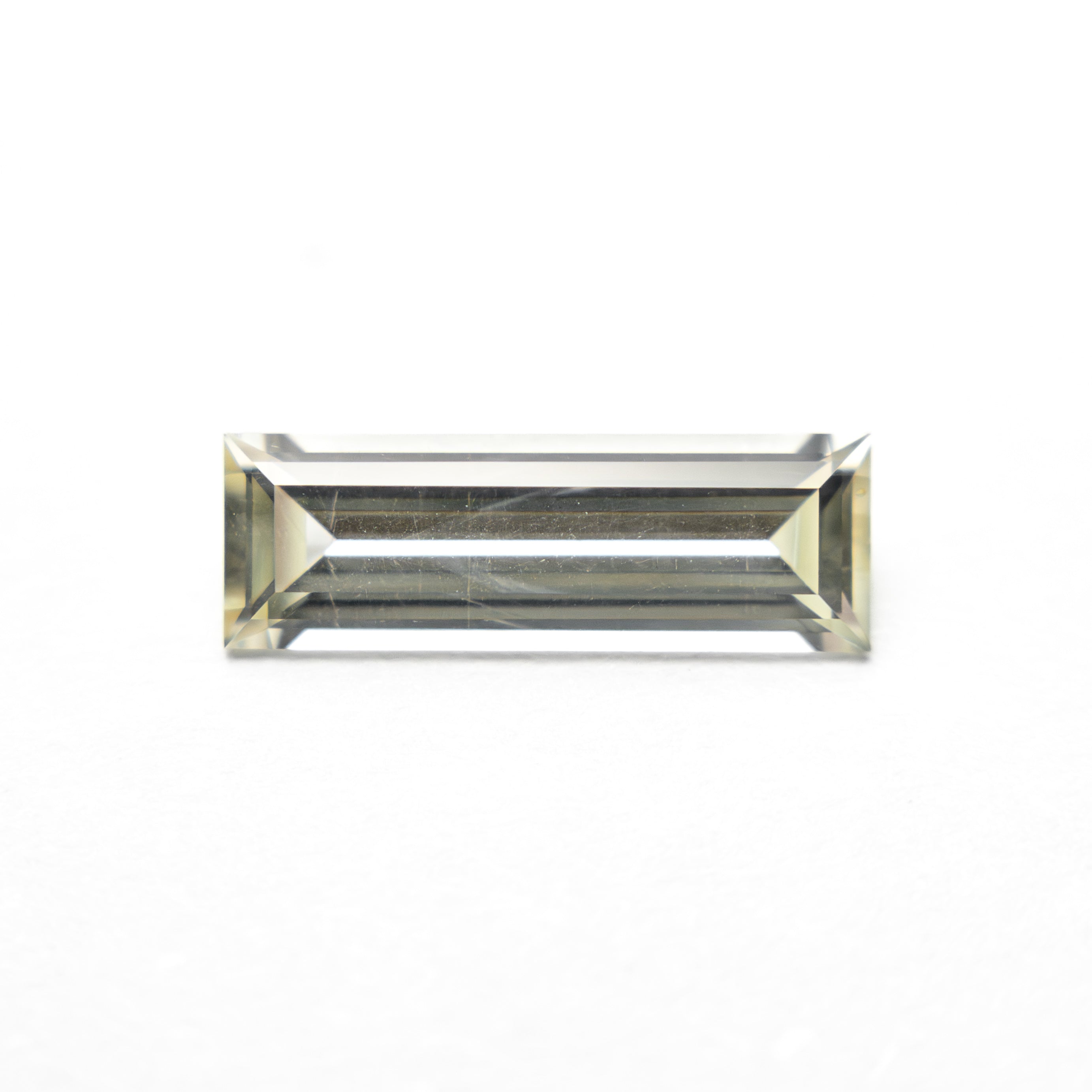 0.84ct 9.95x3.36x2.17mm Baguette Step Cut Sapphire 27719-01
