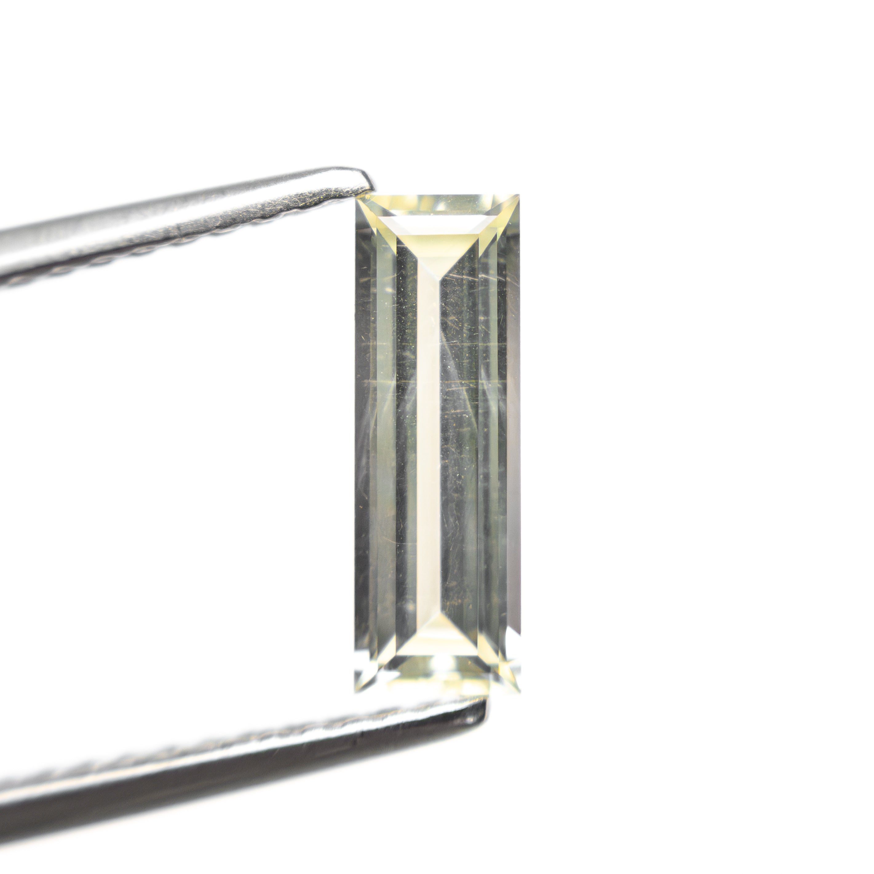0.84ct 9.95x3.36x2.17mm Baguette Step Cut Sapphire 27719-01