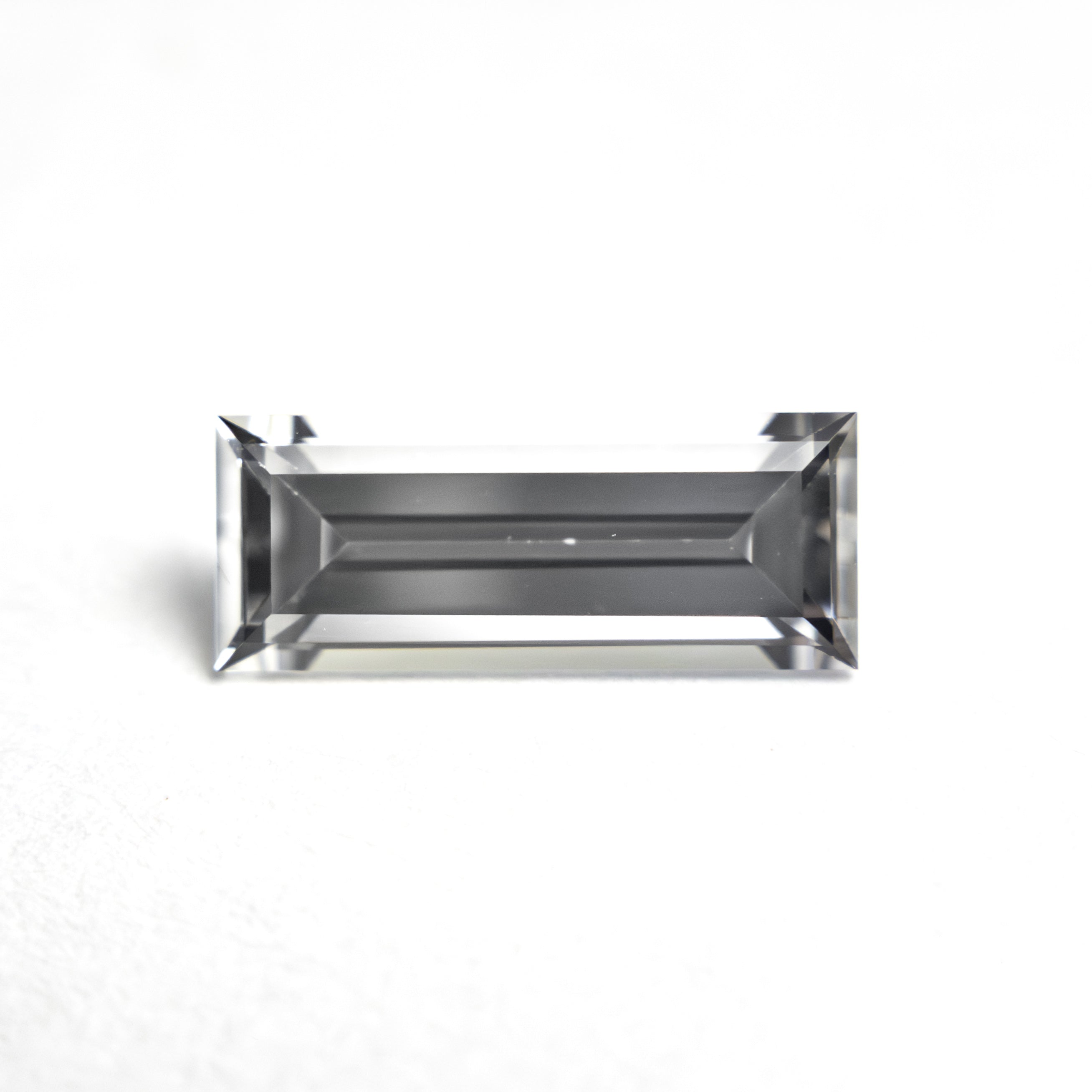 1.06ct 9.53x3.81x2.64mm Baguette Step Cut Sapphire 27720-07