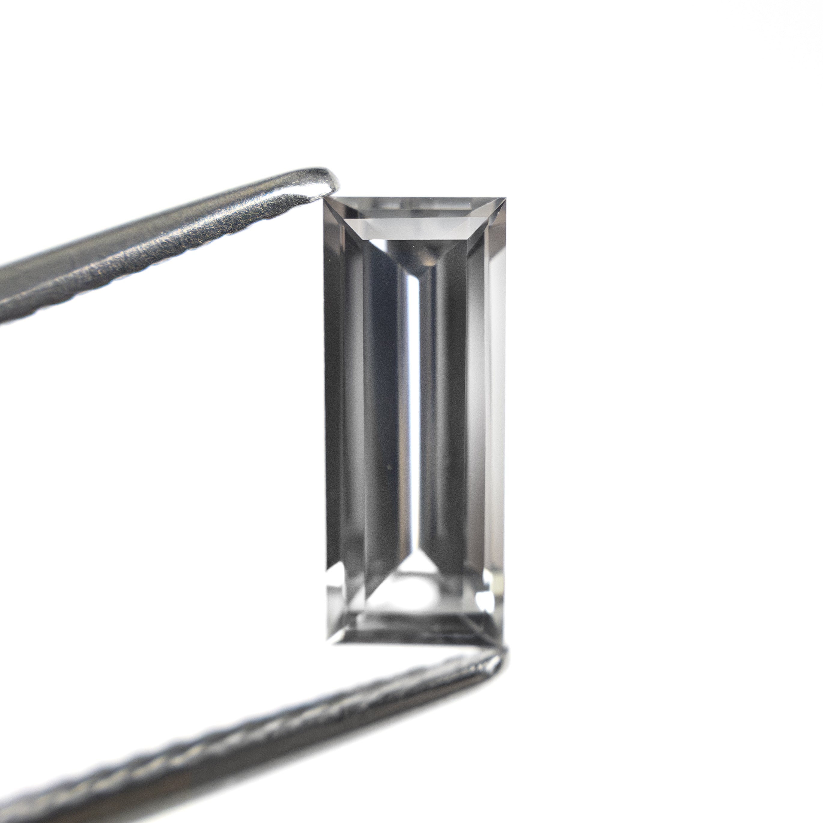 1.06ct 9.53x3.81x2.64mm Baguette Step Cut Sapphire 27720-07