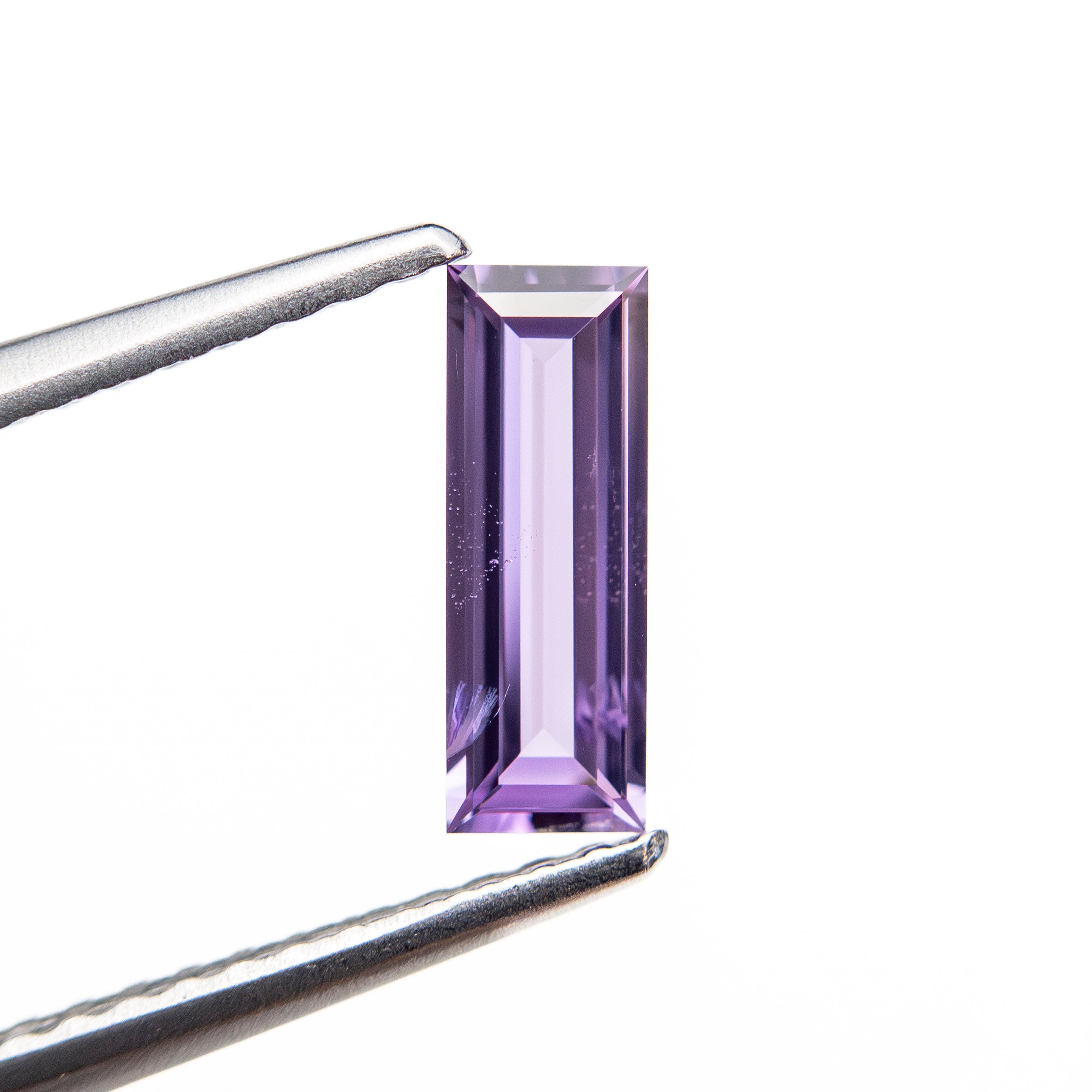 0.53ct 8.54x3.04x1.74mm Baguette Step Cut Sapphire 27721-09